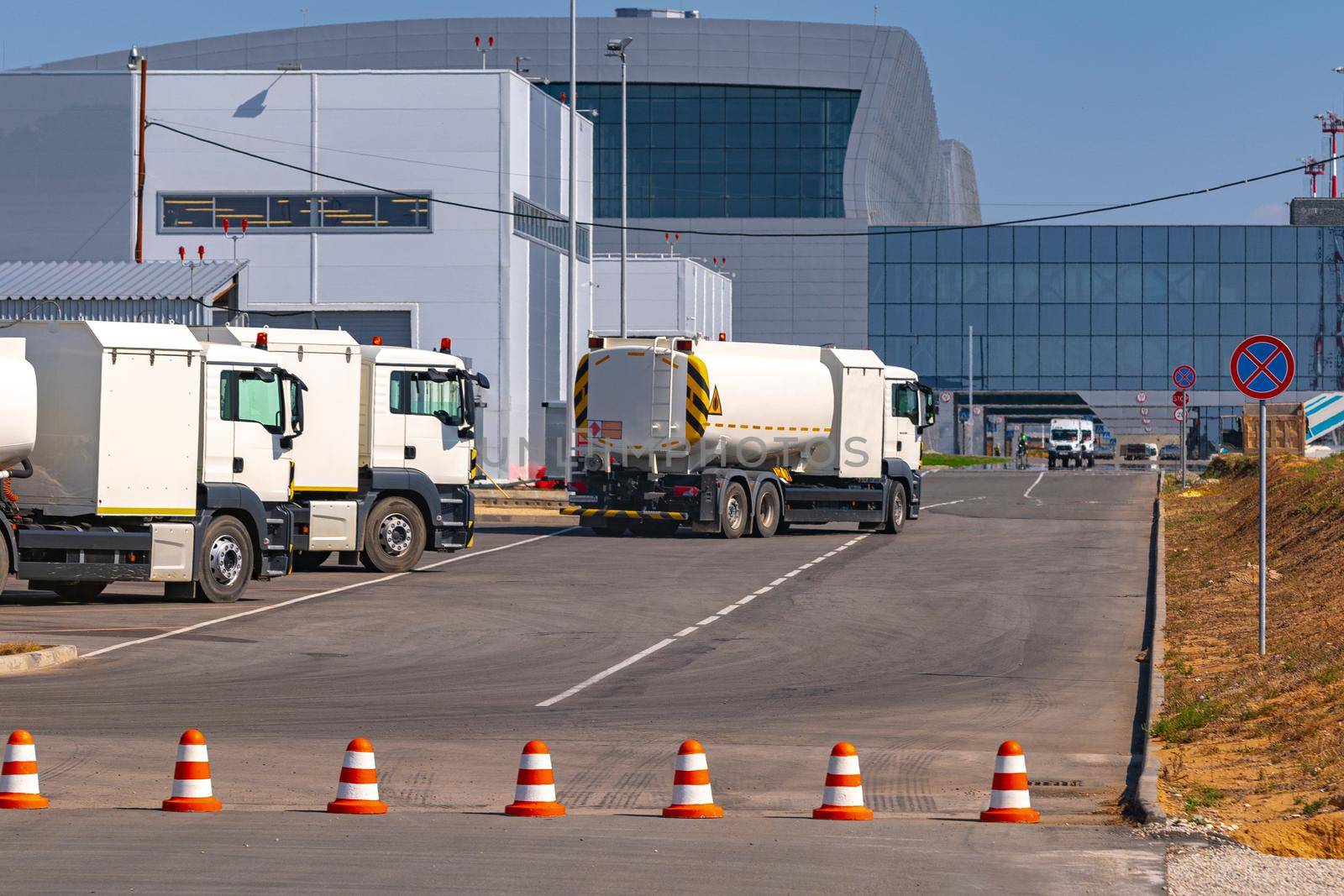 Service vehicle truck parked near the airport terminal building