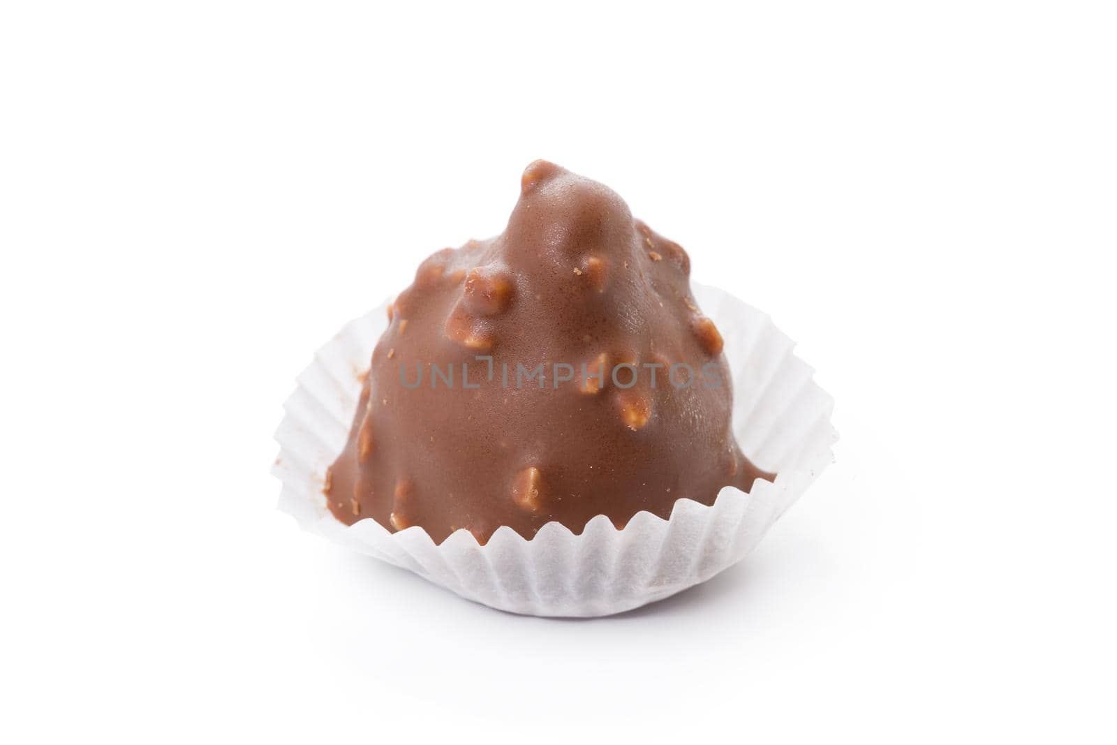One homemade chocolate candy isolated on white by Fabrikasimf