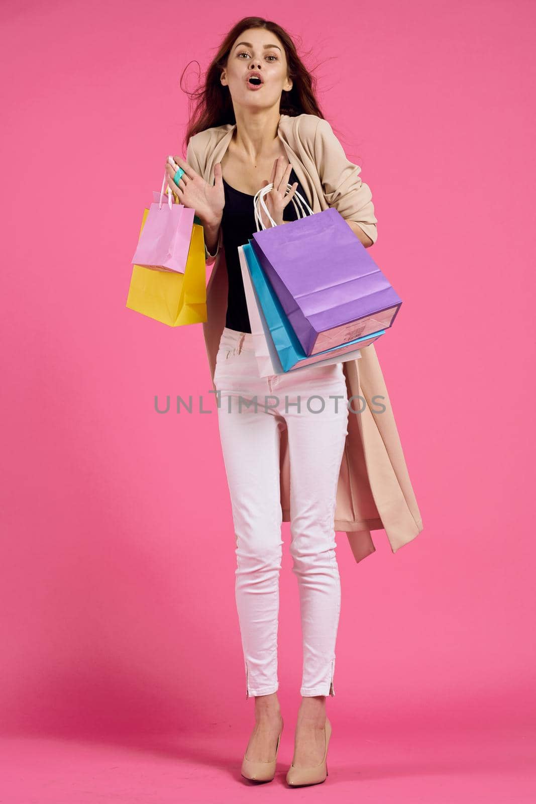 glamorous woman attractive look shopping smile summer style pink background. High quality photo