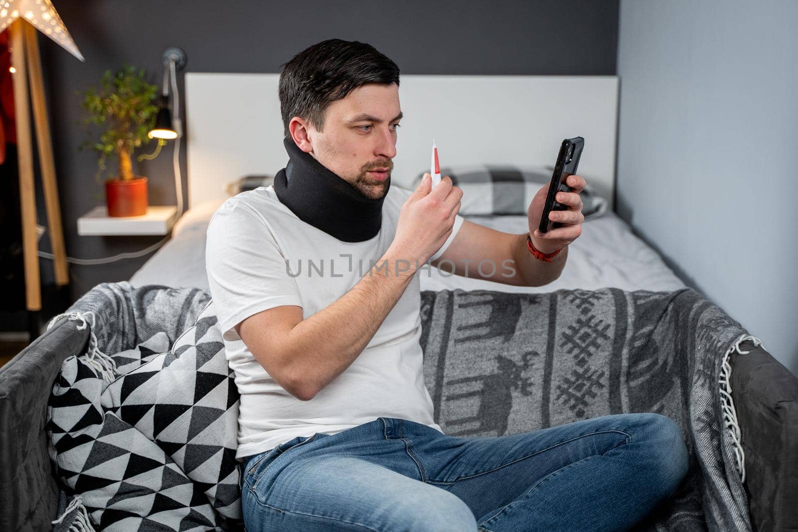 Topic online consultation with doctor. Man with neck collar complains of neck pain after an injury and asks for stronger medication from health care provider during video communication conference.