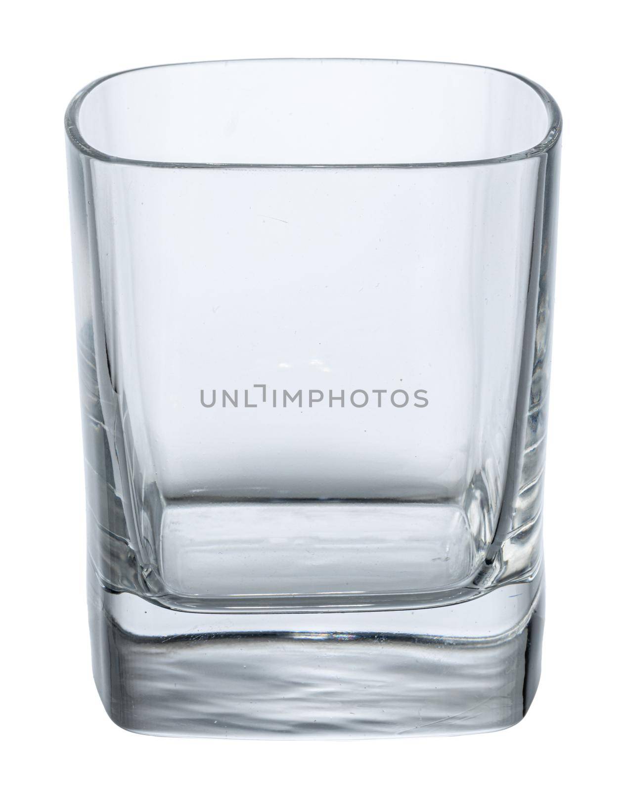 Empty glass cup isolated on white background close up