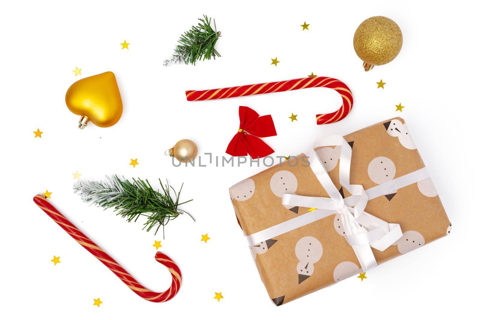 Top view of Christmas decorations composition on white background with copy space