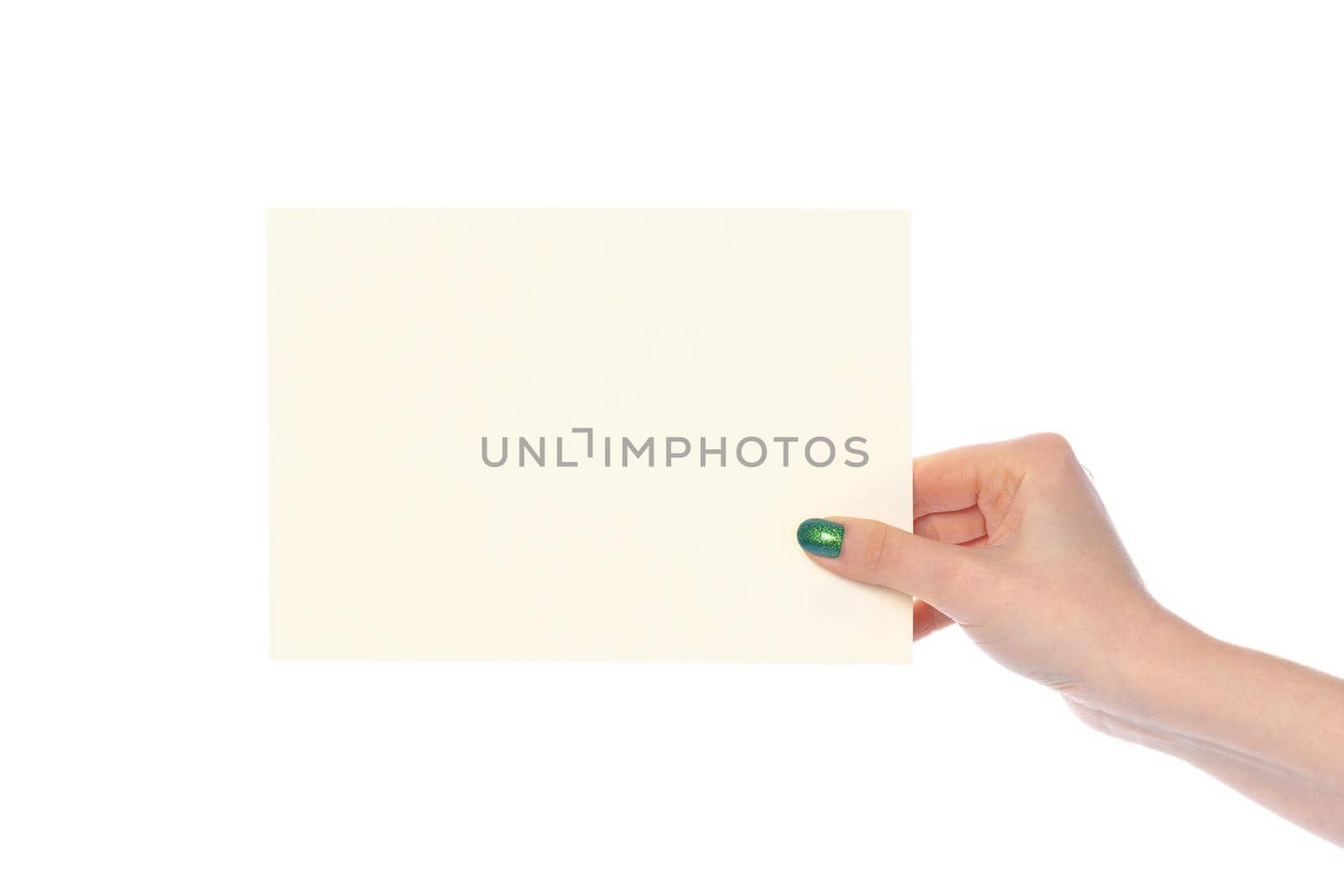 Woman's hand showing white paper banner isolated on white background