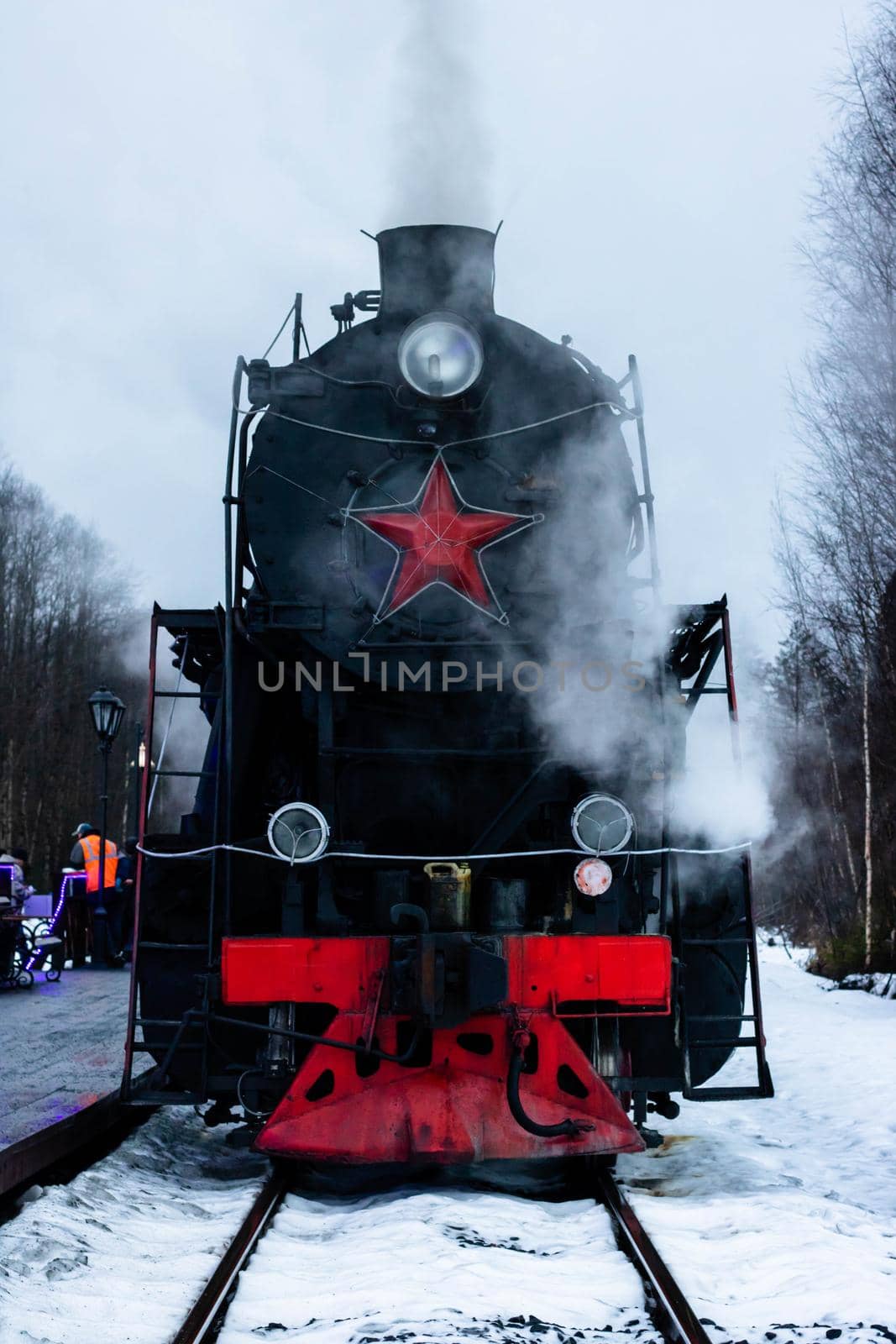 Vintage black steam locomotive train rush railway. by lapushka62