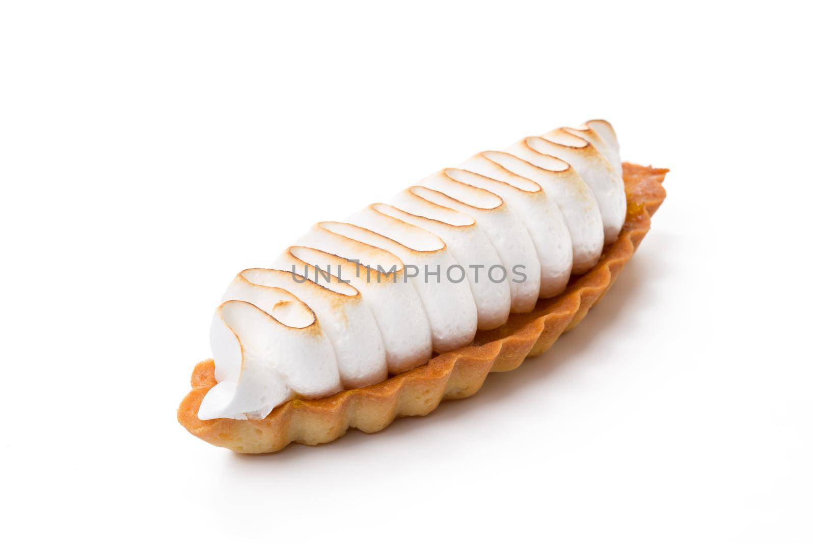 Lemon tart with meringue topping isolated on white background