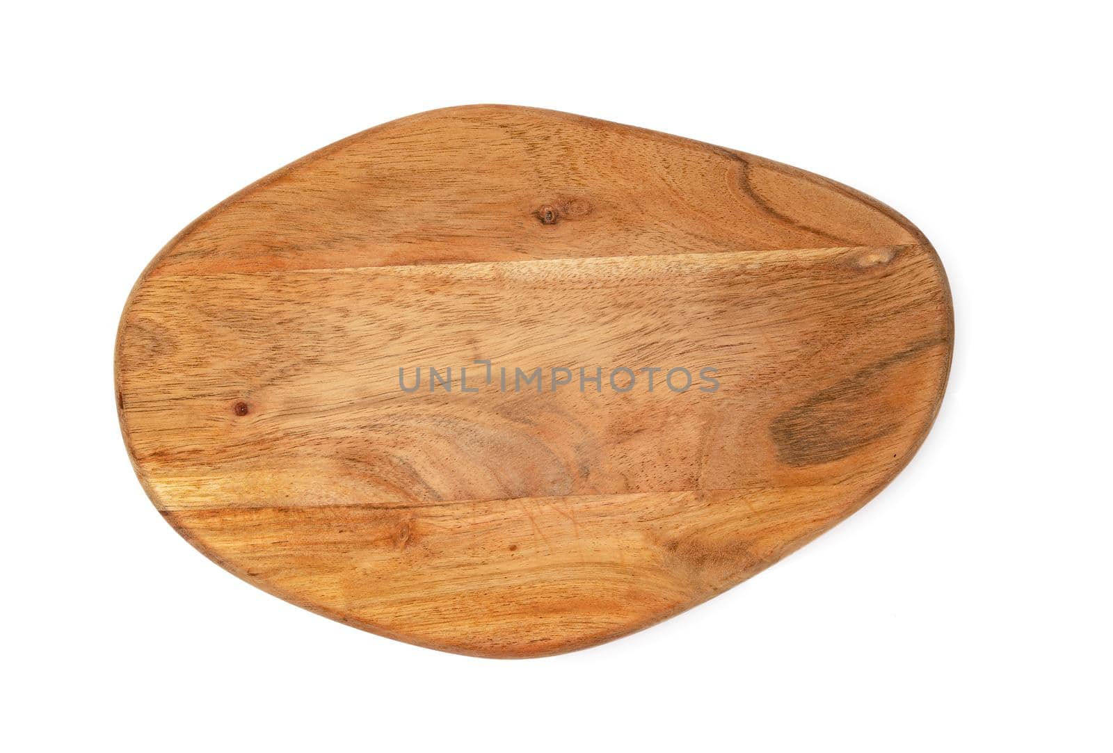 Wooden cutting board on a white background, close up