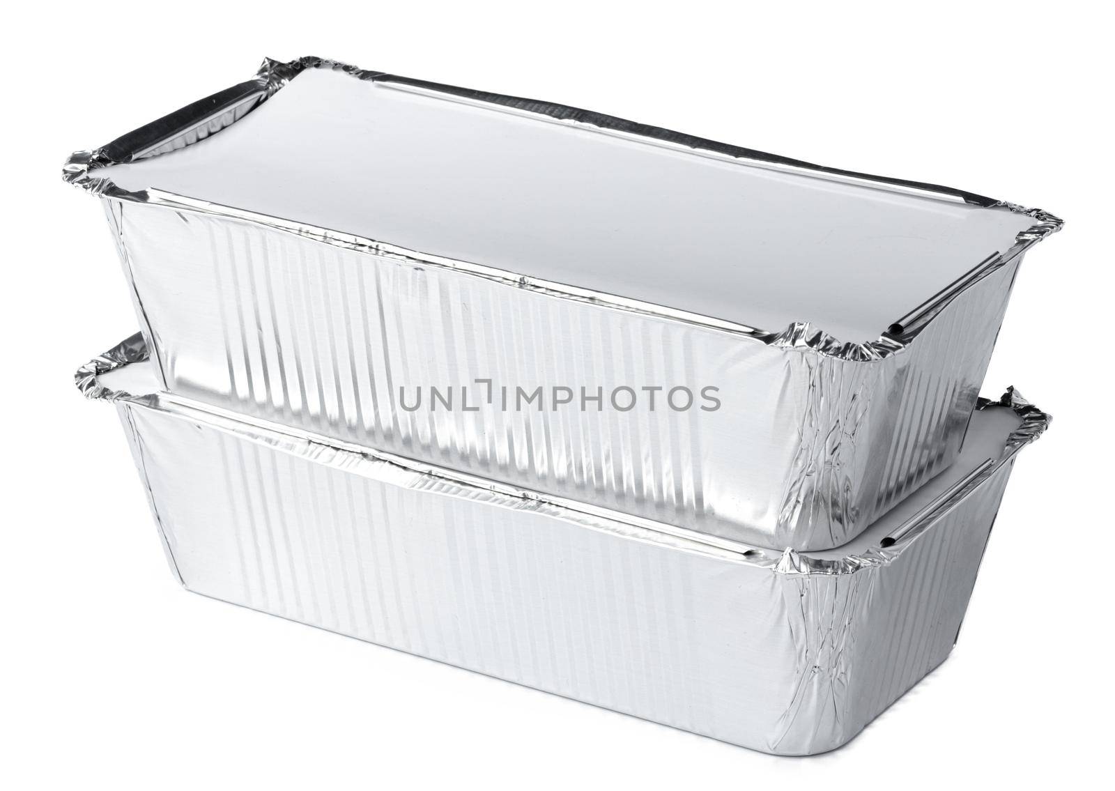 Packed foil food boxes on white background, copy space, close up