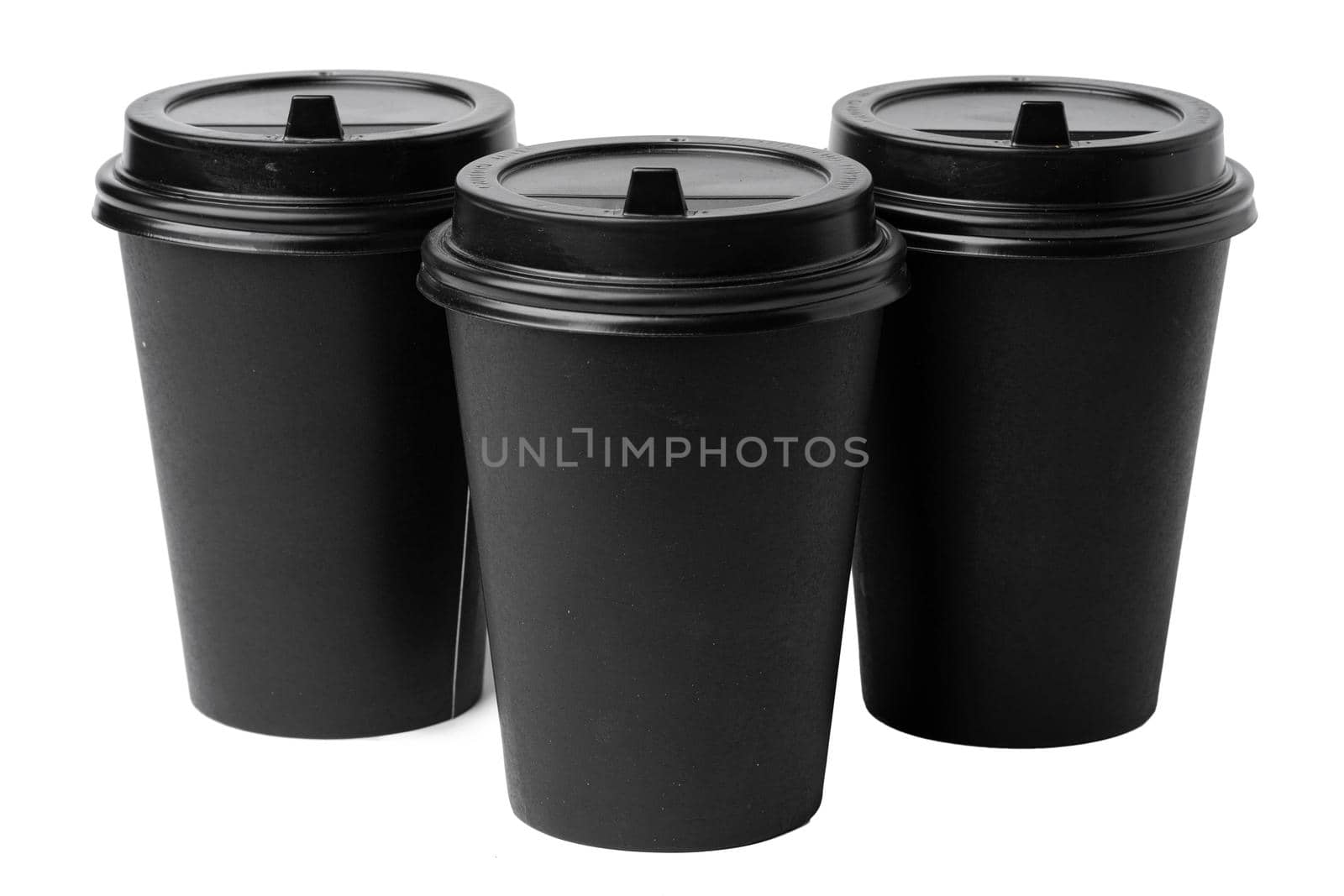 Paper coffee cups isolated on white background. Close up.