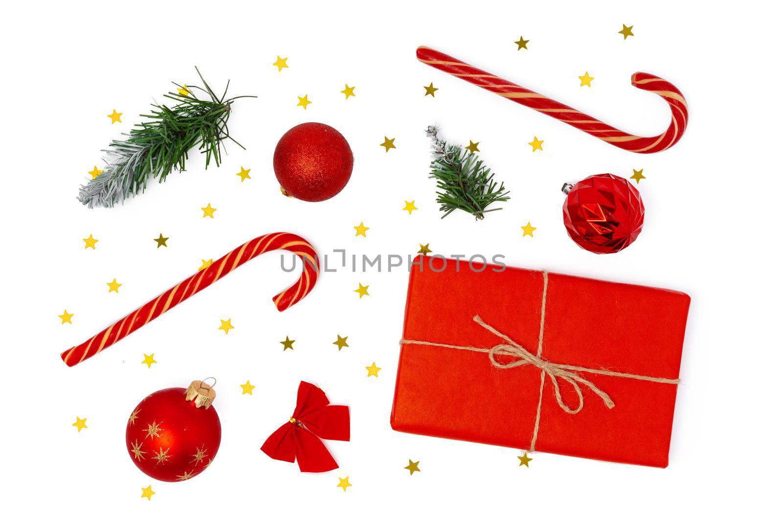 Top view of Christmas decorations composition on white background with copy space