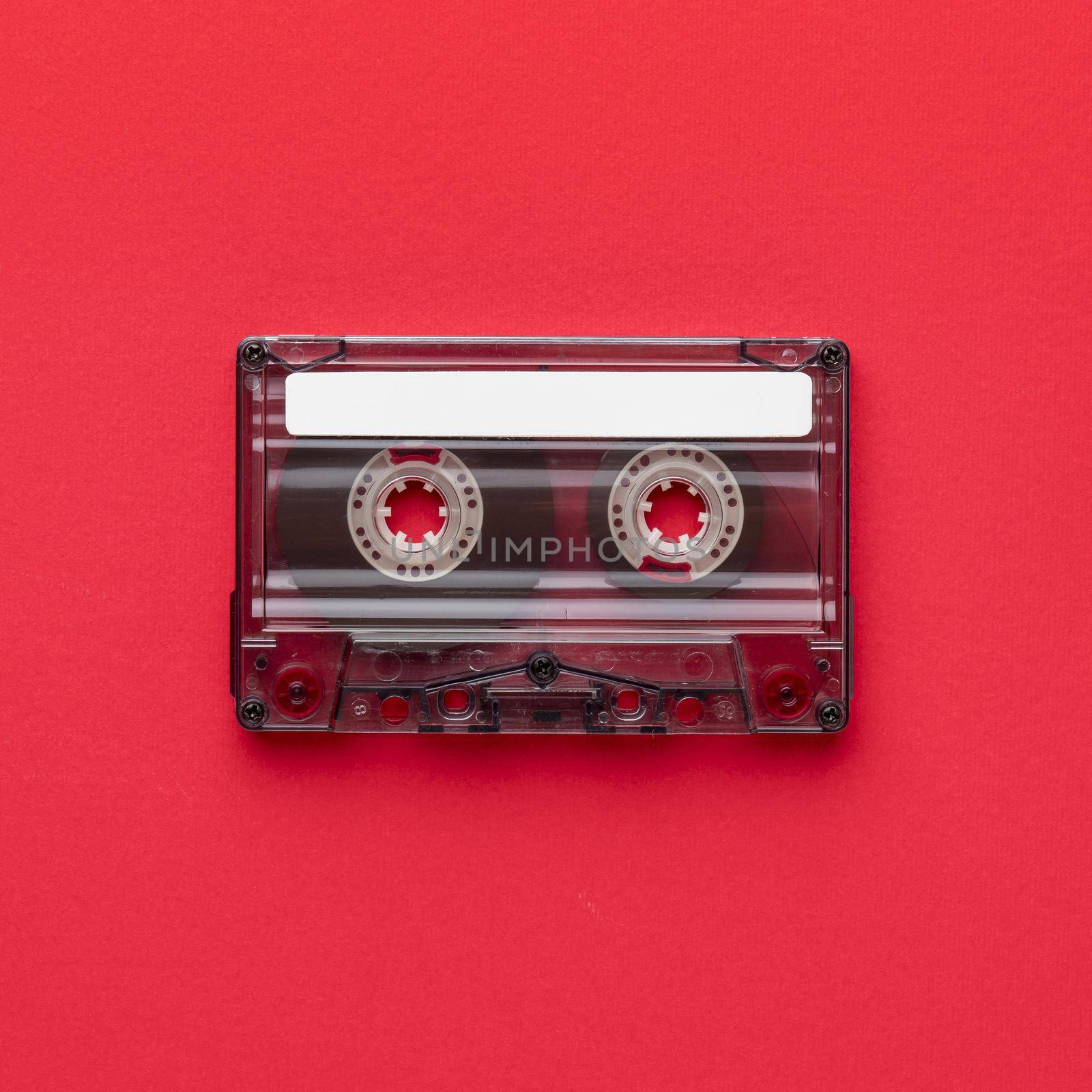 flat lay minimalist vintage cassette tape by Zahard
