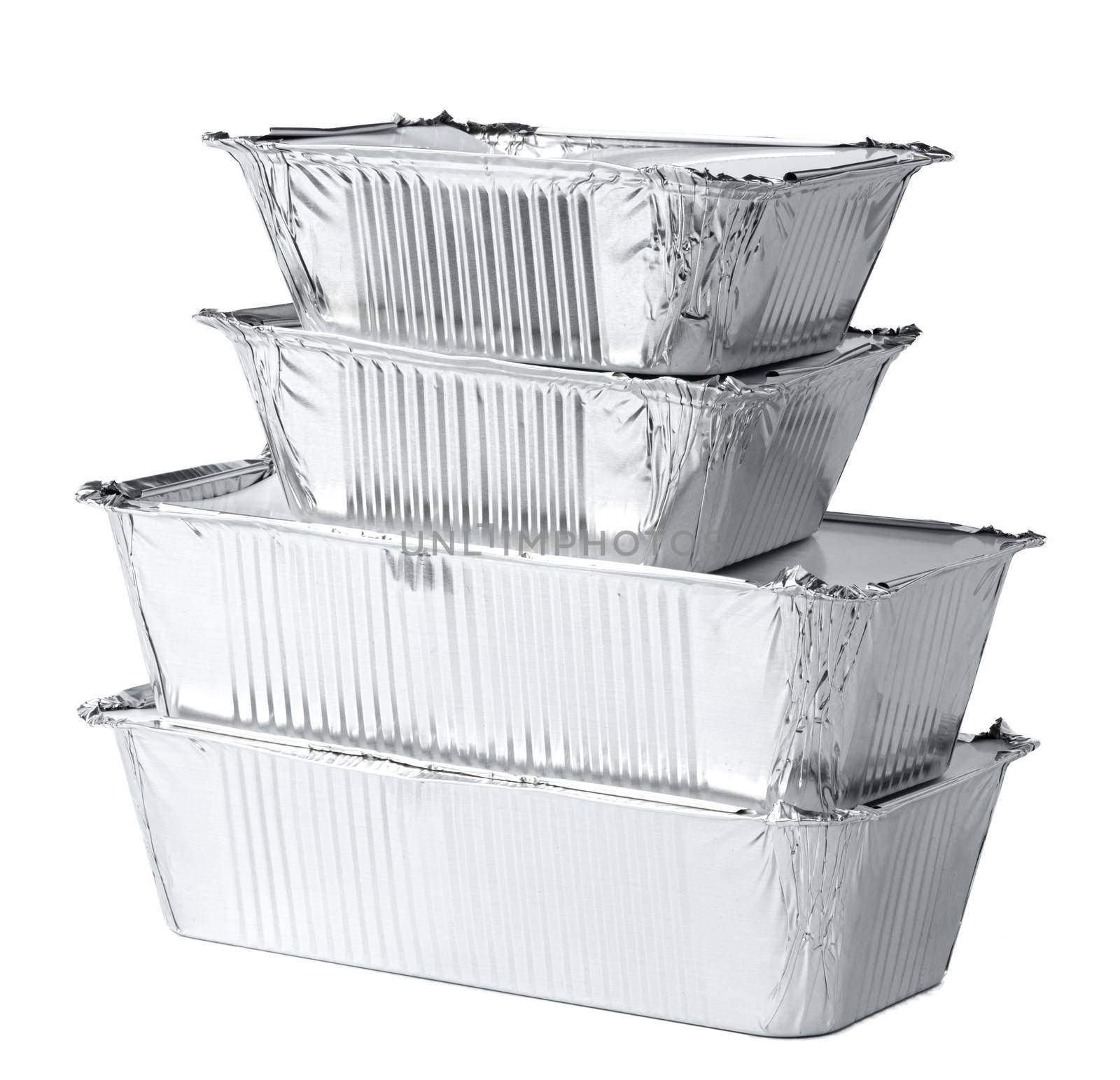 Packed foil food boxes on white background, copy space, close up