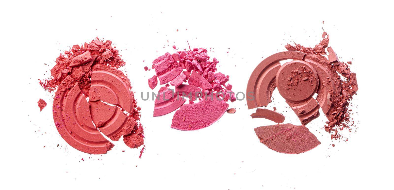 Smashed pink blush cosmetics isolated on white background by Fabrikasimf