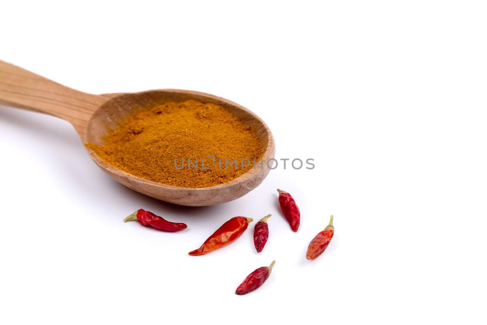 Paprika spice in wooden spoon. Picture of a Paprika spice in wooden spoon.