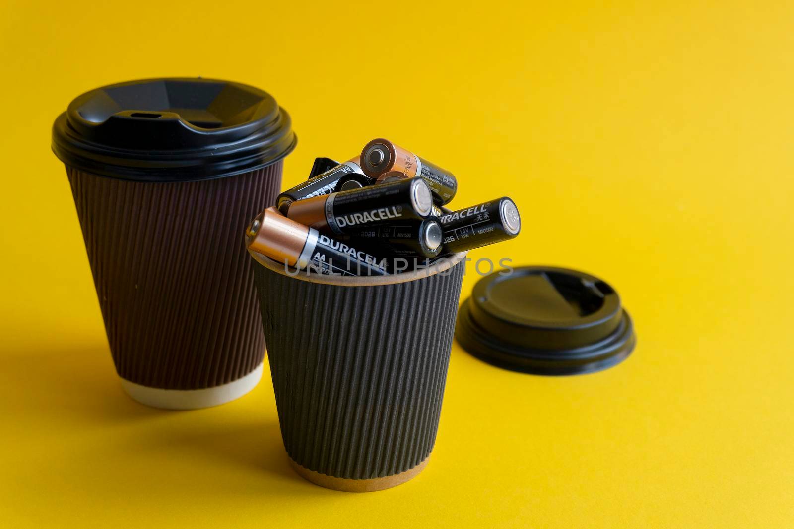 Kiev, Urkaine, 16 June 2020, Duracell AA batteries are in coffee takeaway cup by uveita