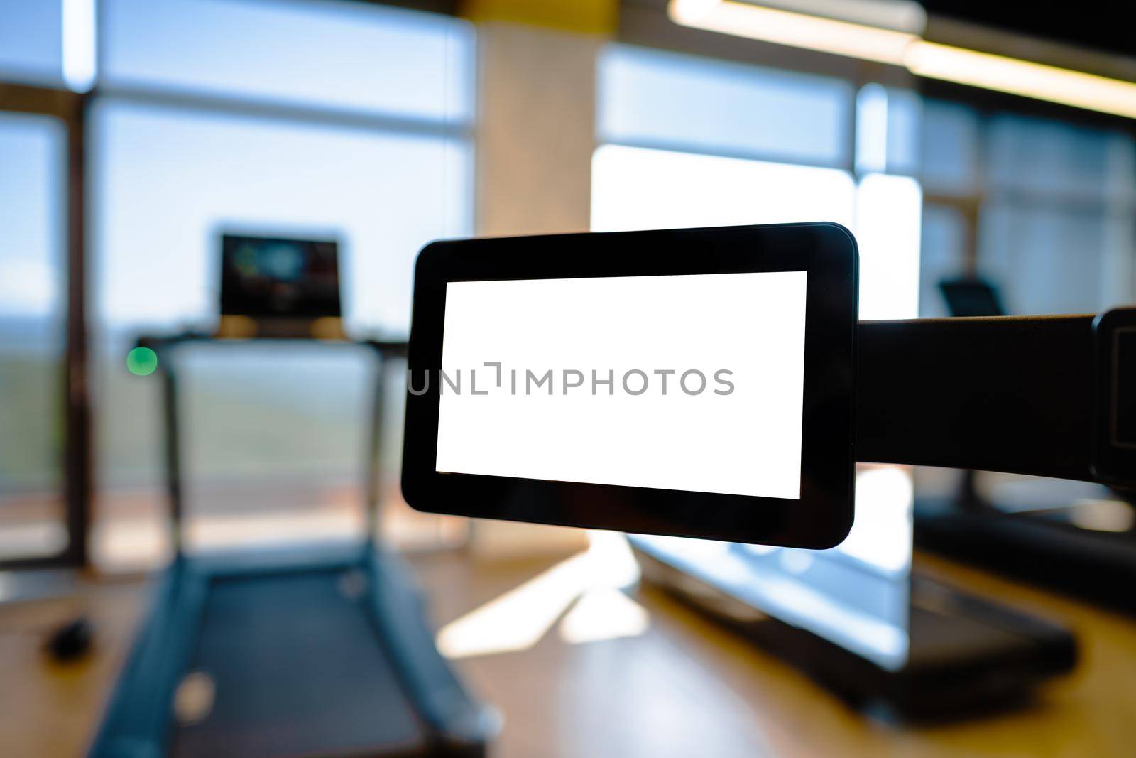 Close up of white screen on gym apparatus in a luxury gym by Fabrikasimf