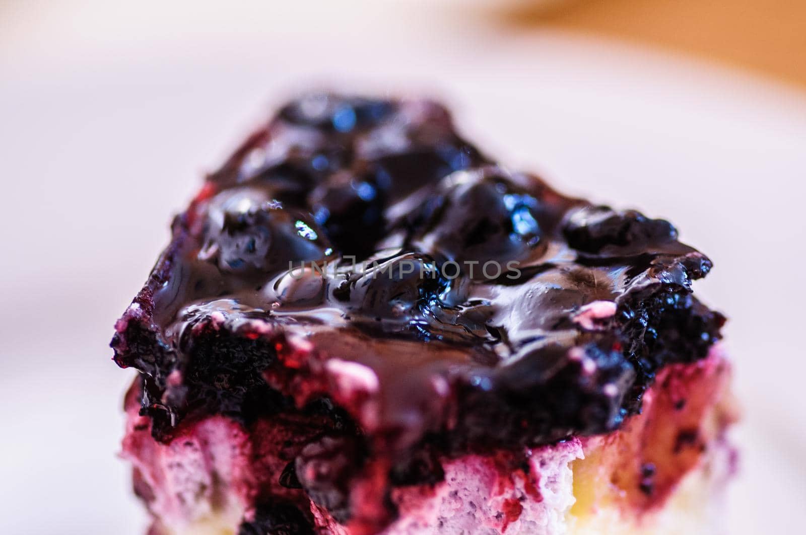 Blueberry pie with raspberries, food close up by shanserika