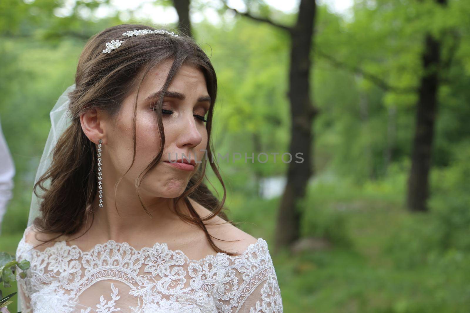 Wedding photography in rustic style emotions of the bride on the nature on the rocks. by lunarts