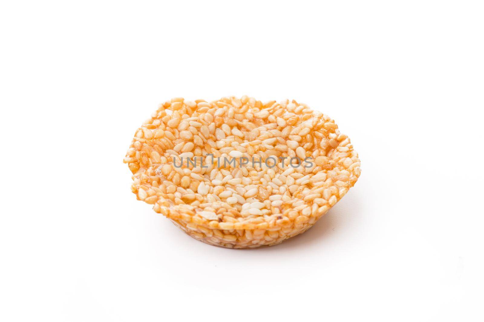 One oat baked cookie isolated on white background