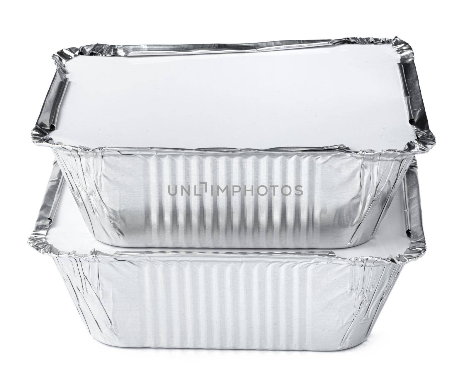 Packed foil food boxes on white background, copy space, close up