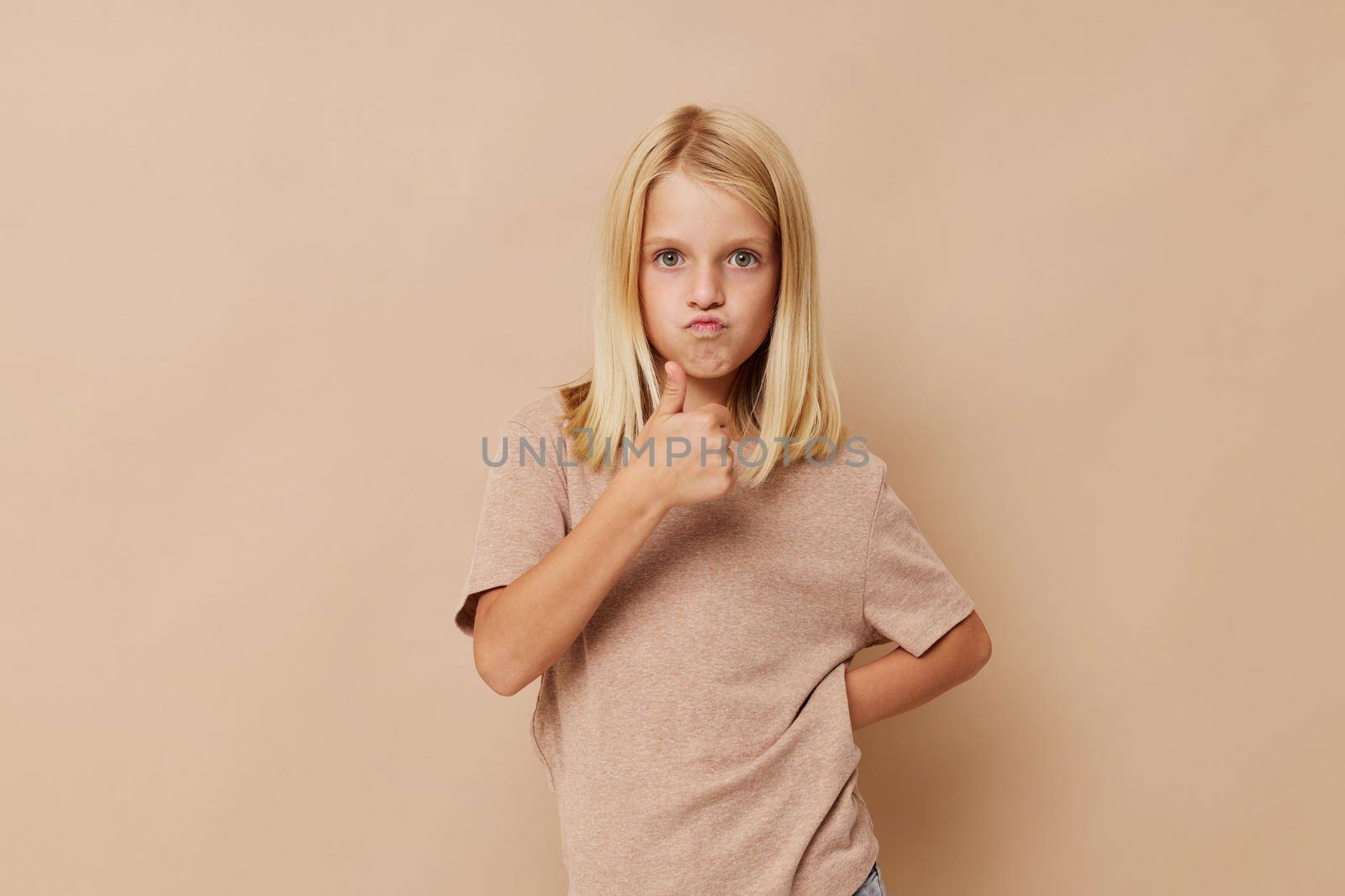 emotional girl Fashion textile baby clothes template isolated background. High quality photo