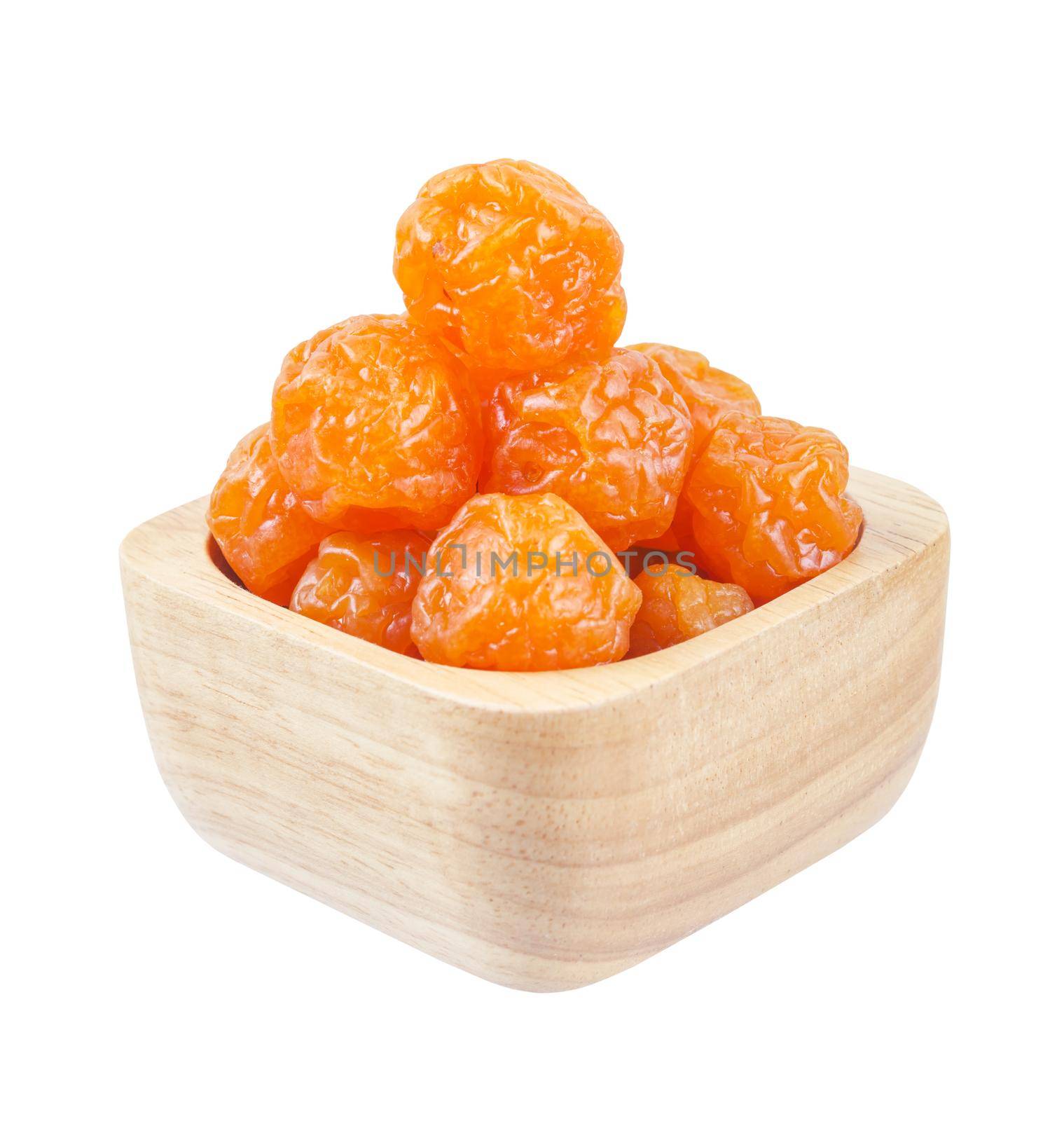 Dried prunes fruits (Preserved fruits Chinese plum) in wooden bowl isolated on white background, save clipping path.