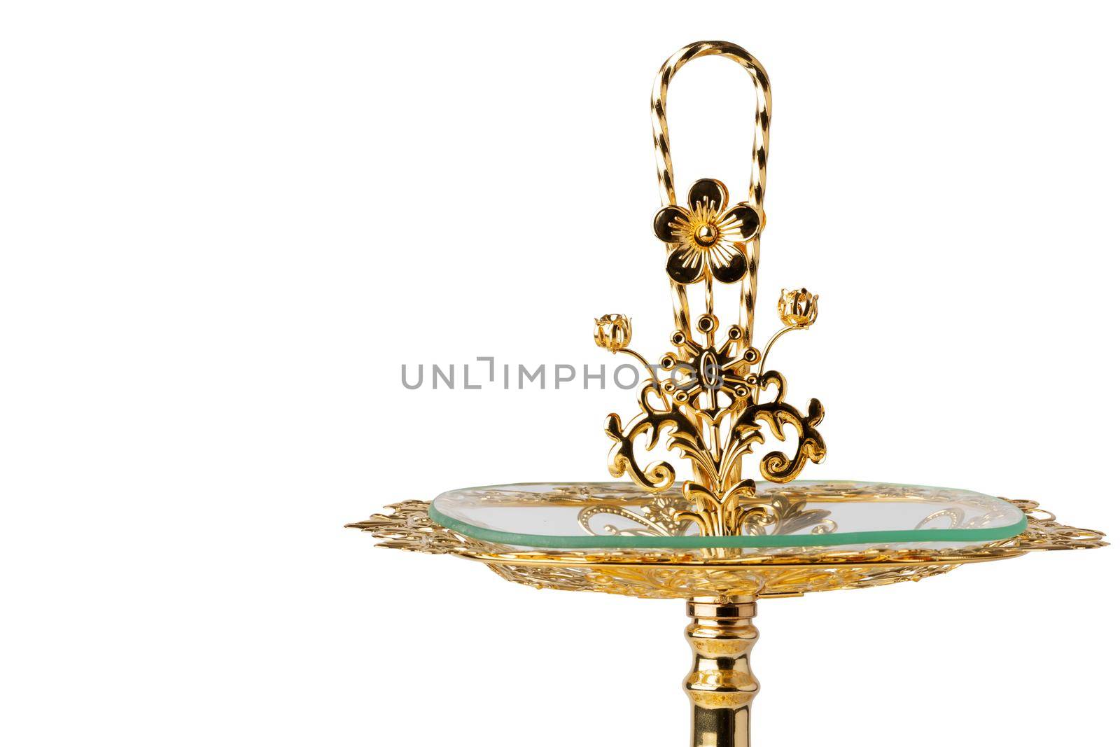 Oriental golden cake stand isolated on white background, close up
