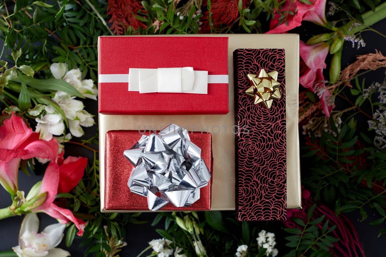 Set of red gift boxes and flowers by Demkat