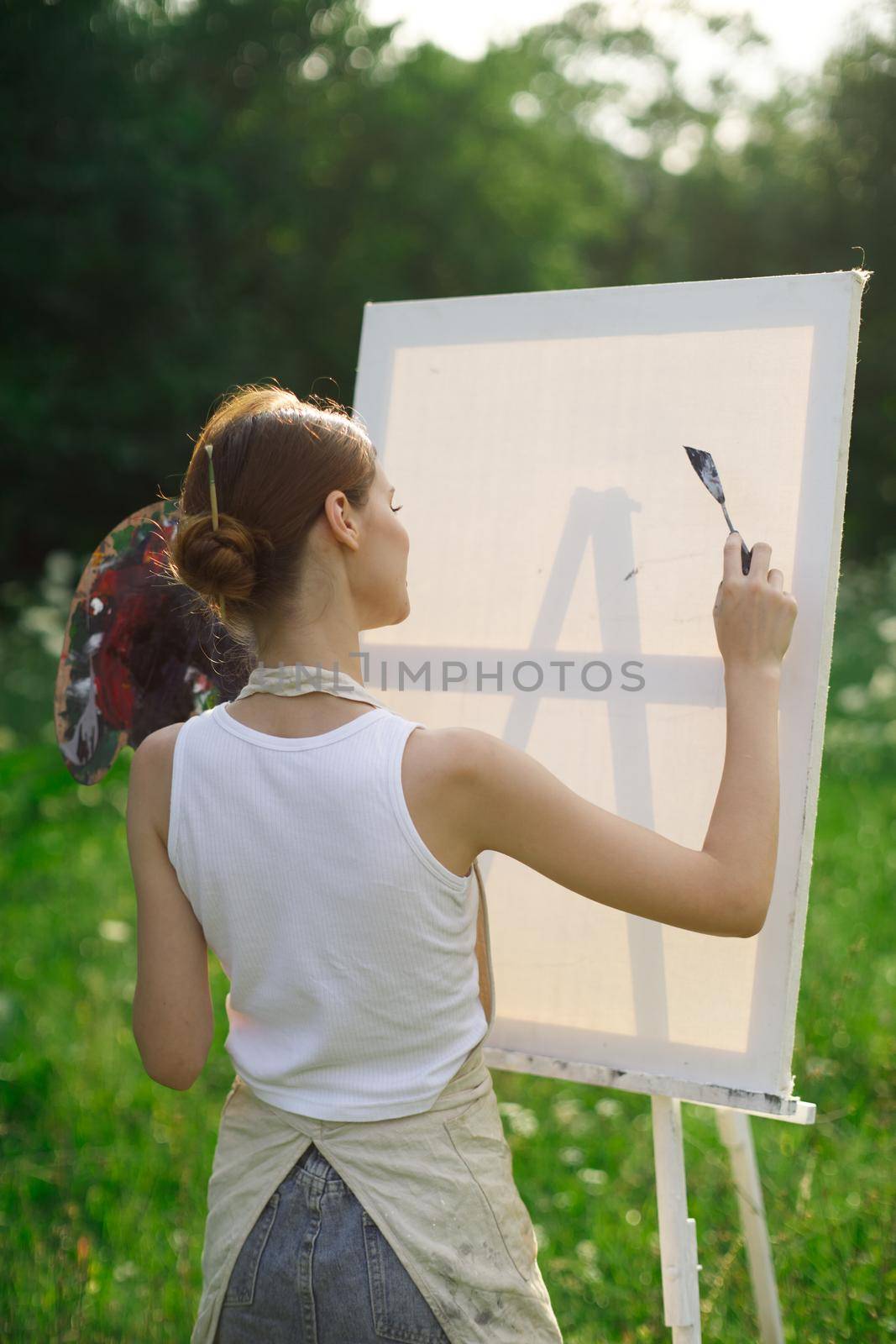 woman artist outdoors paint palette painting landscape by Vichizh