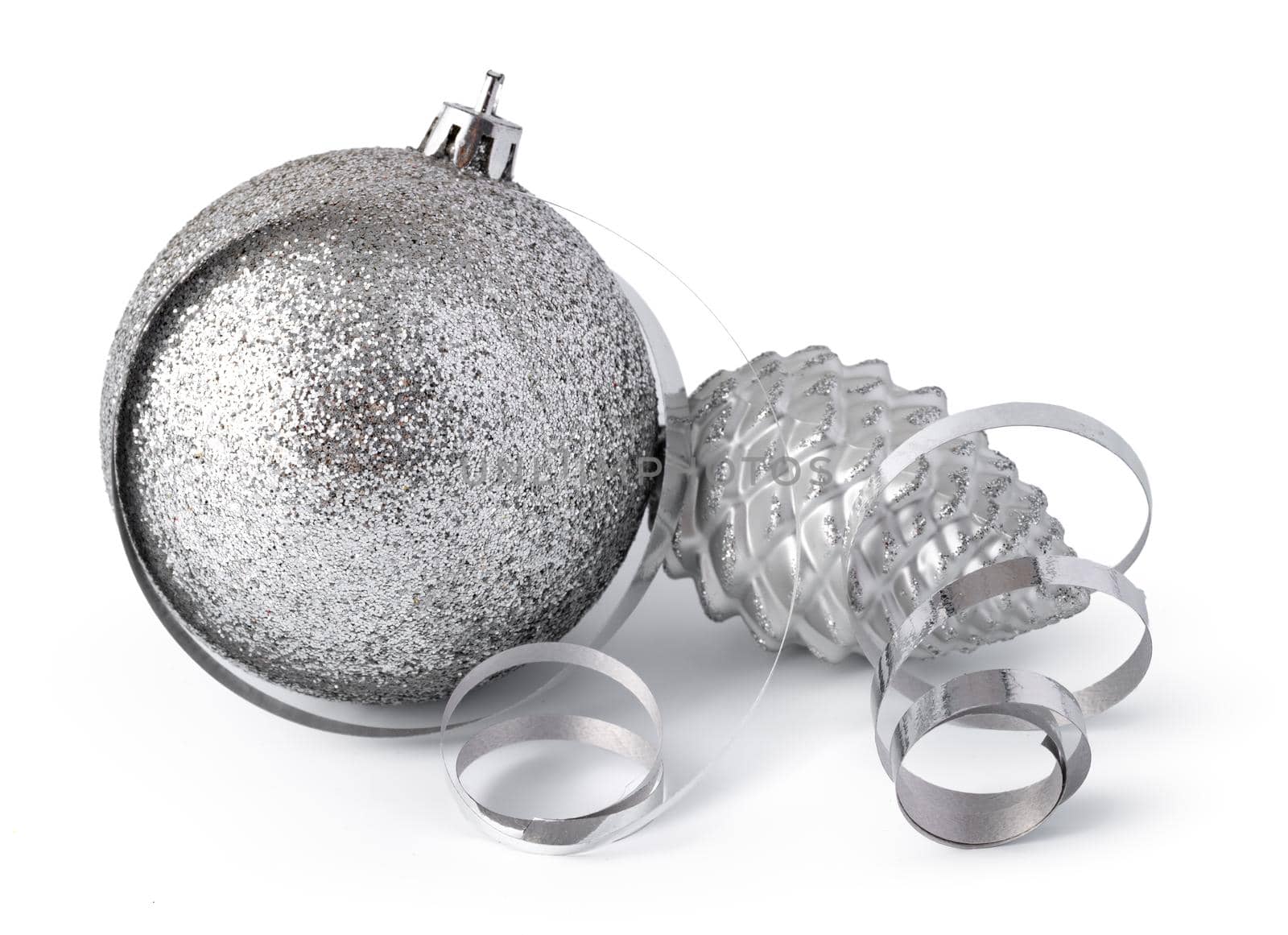 Silver sparkling Christmas baubles isolated on white background, close up