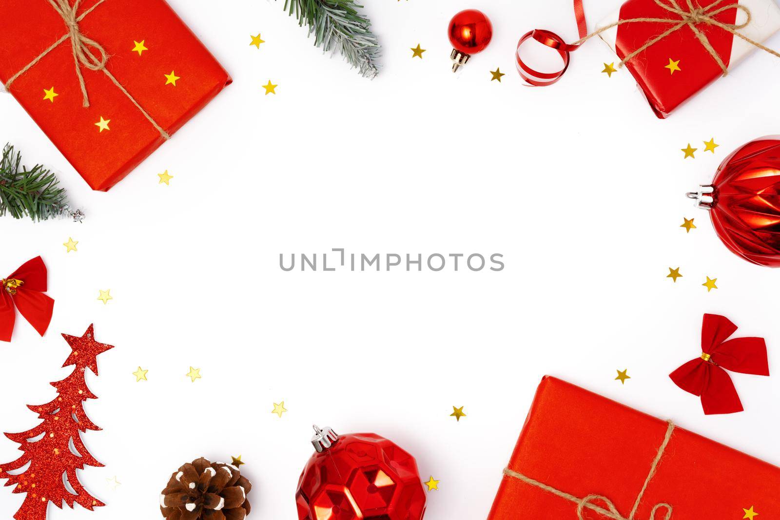 Top view Christmas decorations composition on white background with copy space by Fabrikasimf
