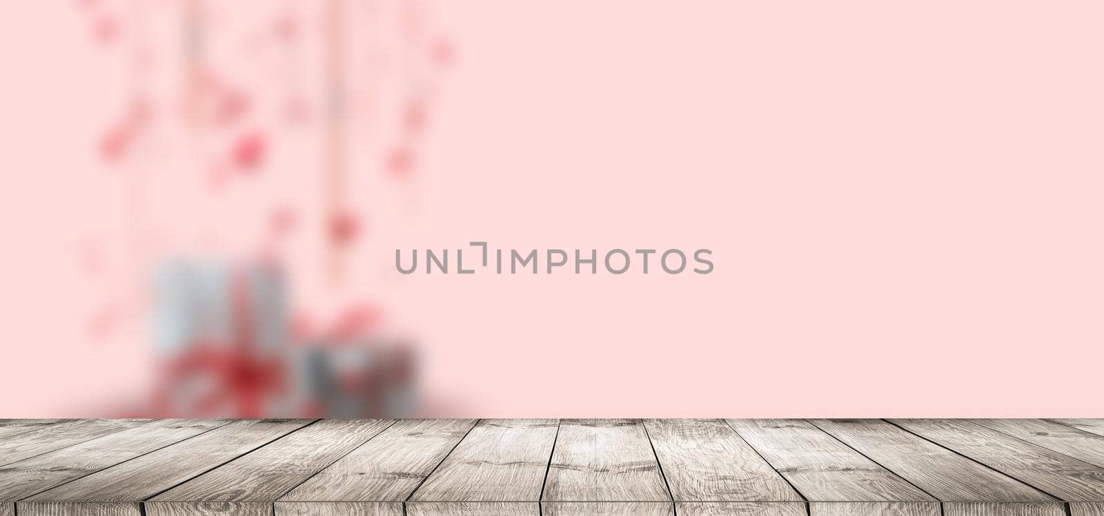 Bokeh background with empty wooden deck table for product montage display.