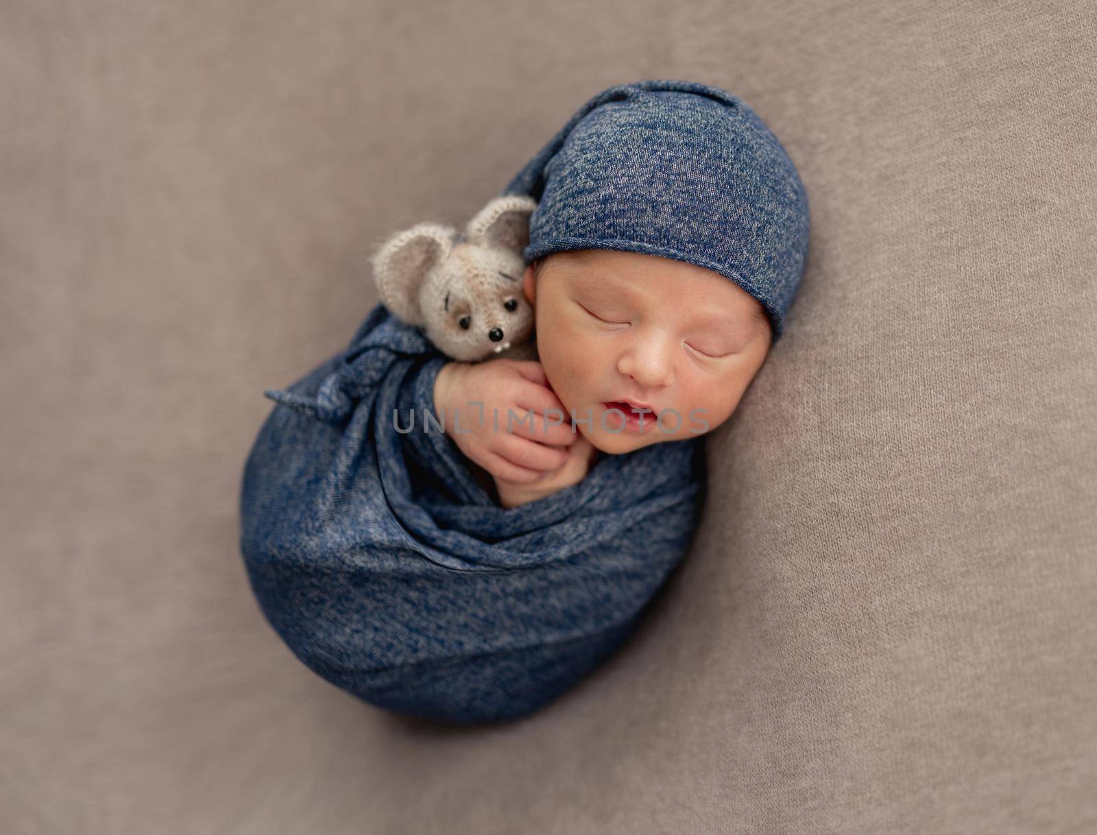 Charming wrapped newborn in dream