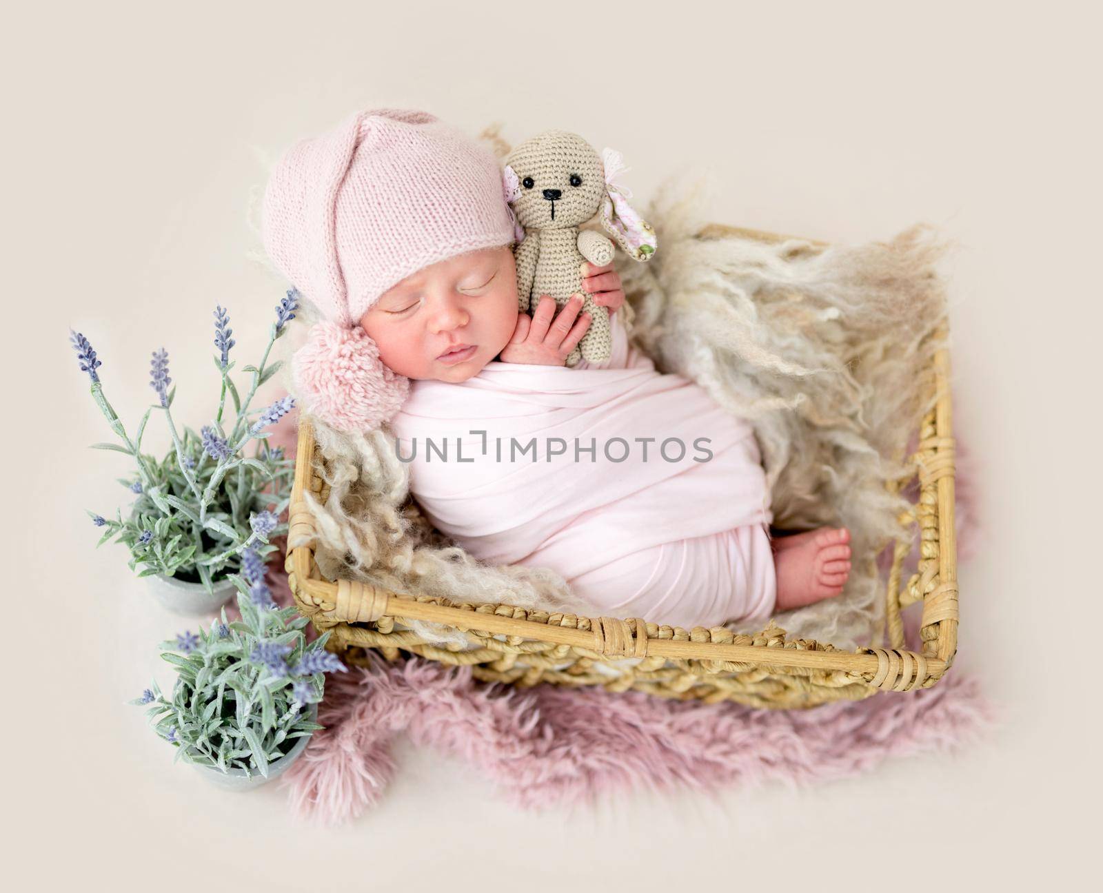 Beautiful newborn baby sleeping comfortable in cradle