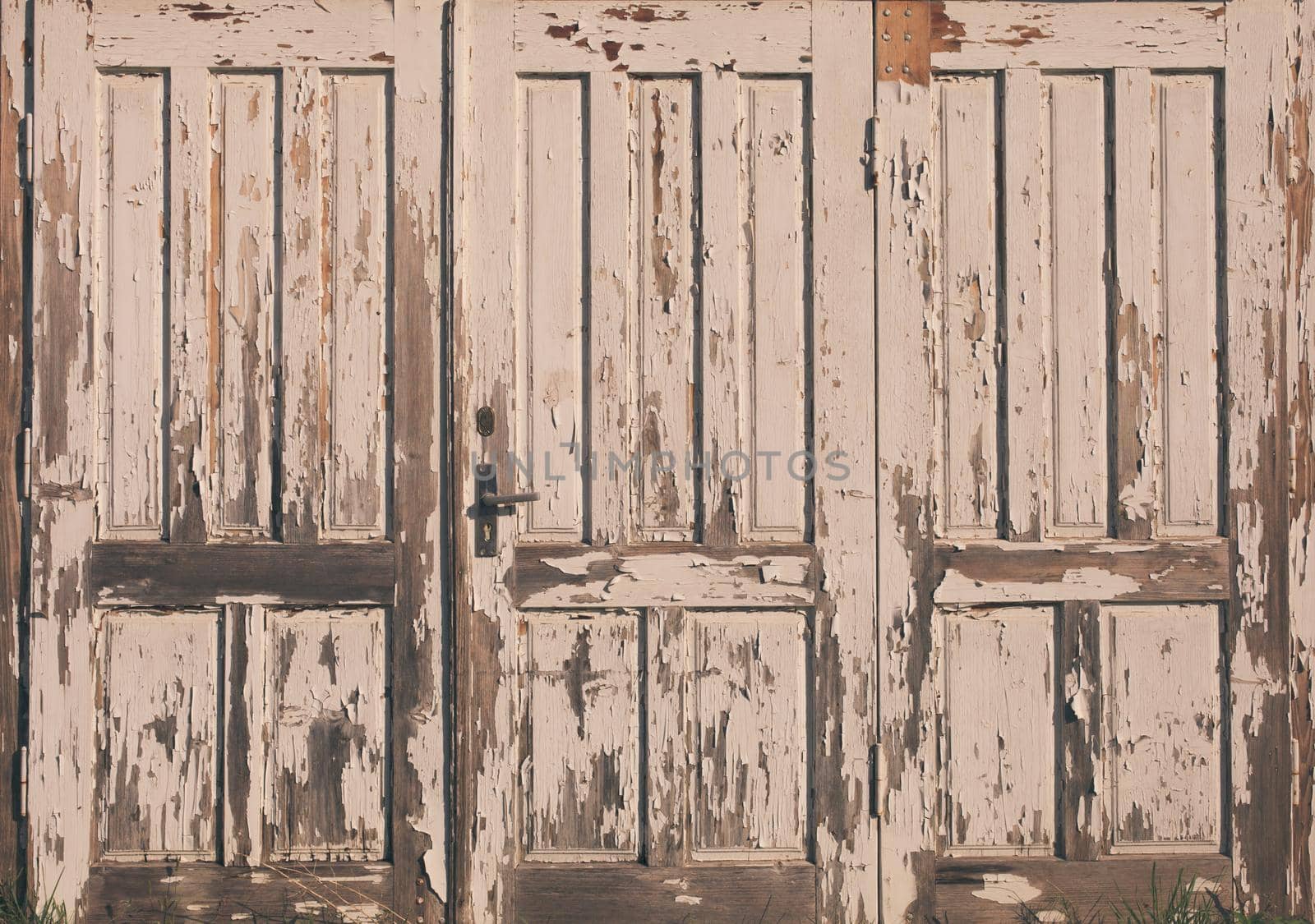 Old vintage wooden door with white paint