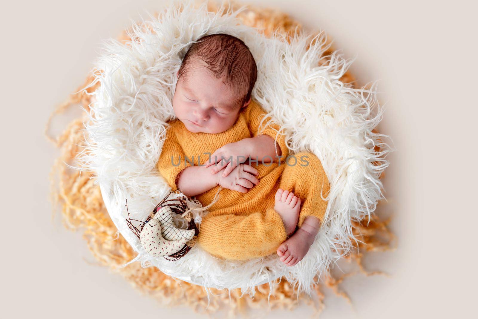 Cute newborn lying in egg cradle by tan4ikk1
