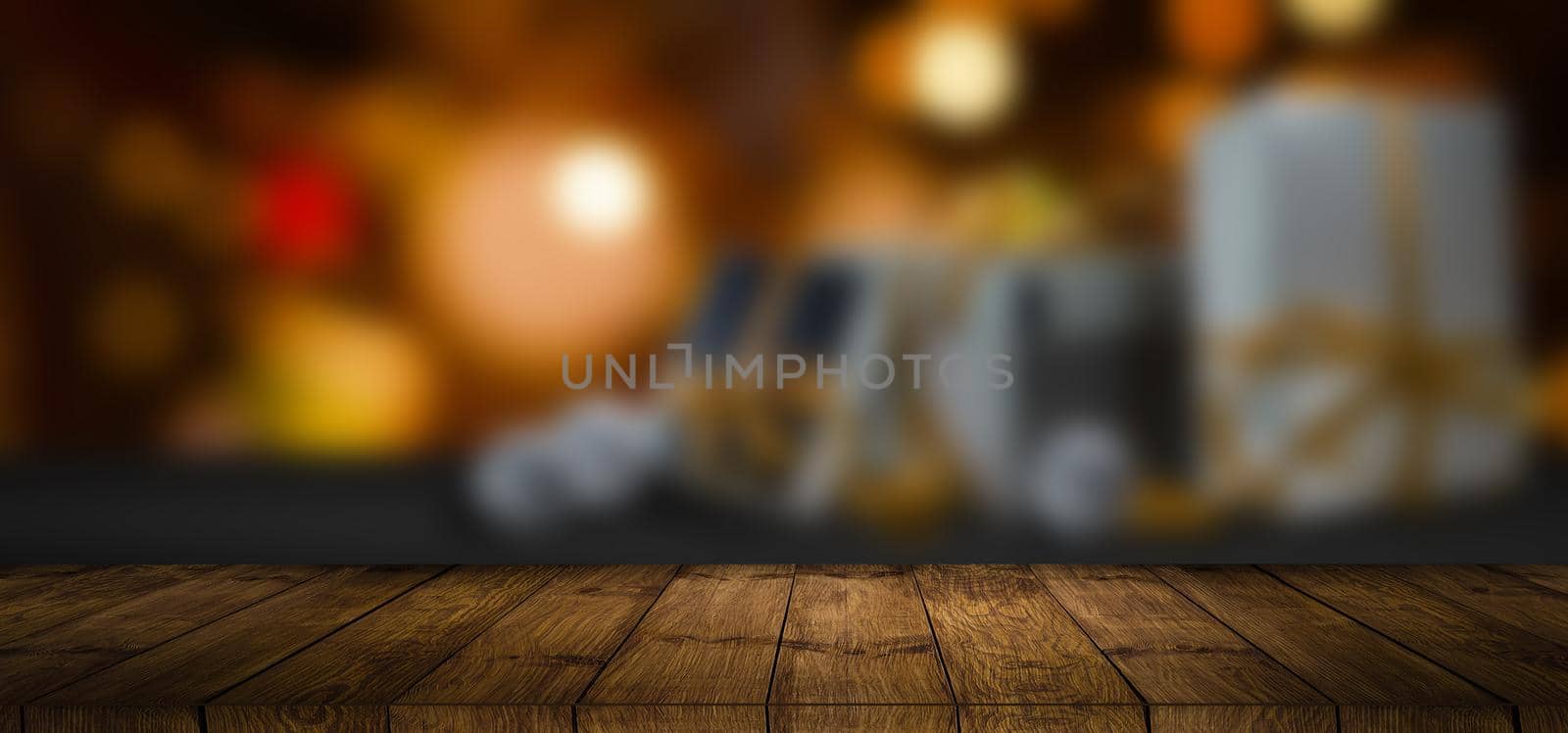 wood table with blured gifts bokeh background.