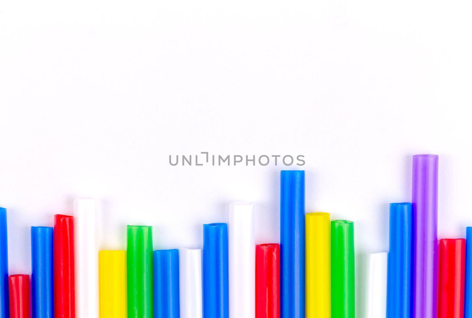 Colorful plastic drinking straws. Colorful plastic drinking straws on white background.