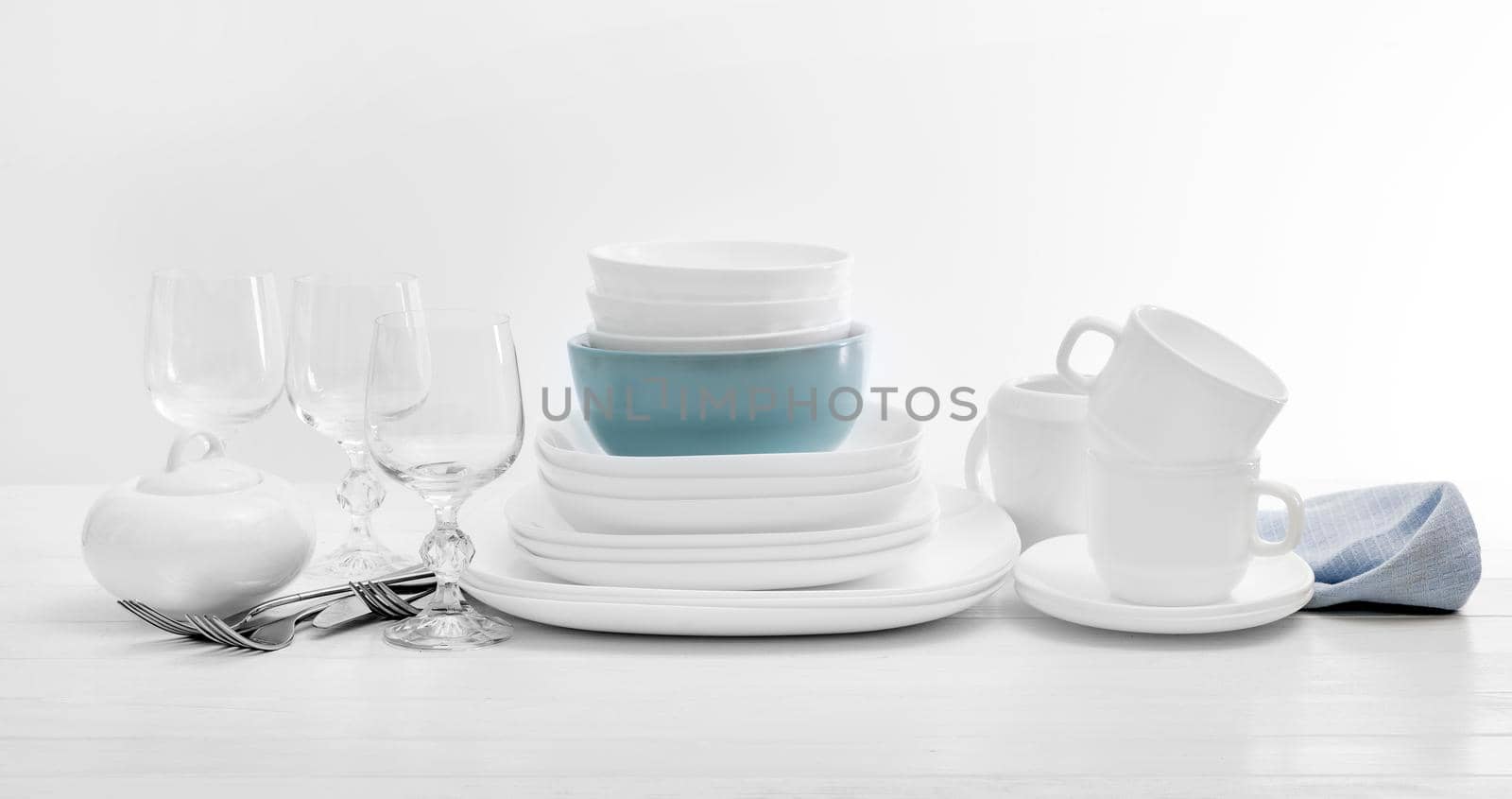 White square dinnerware set. Piece dinnerware set with glasses