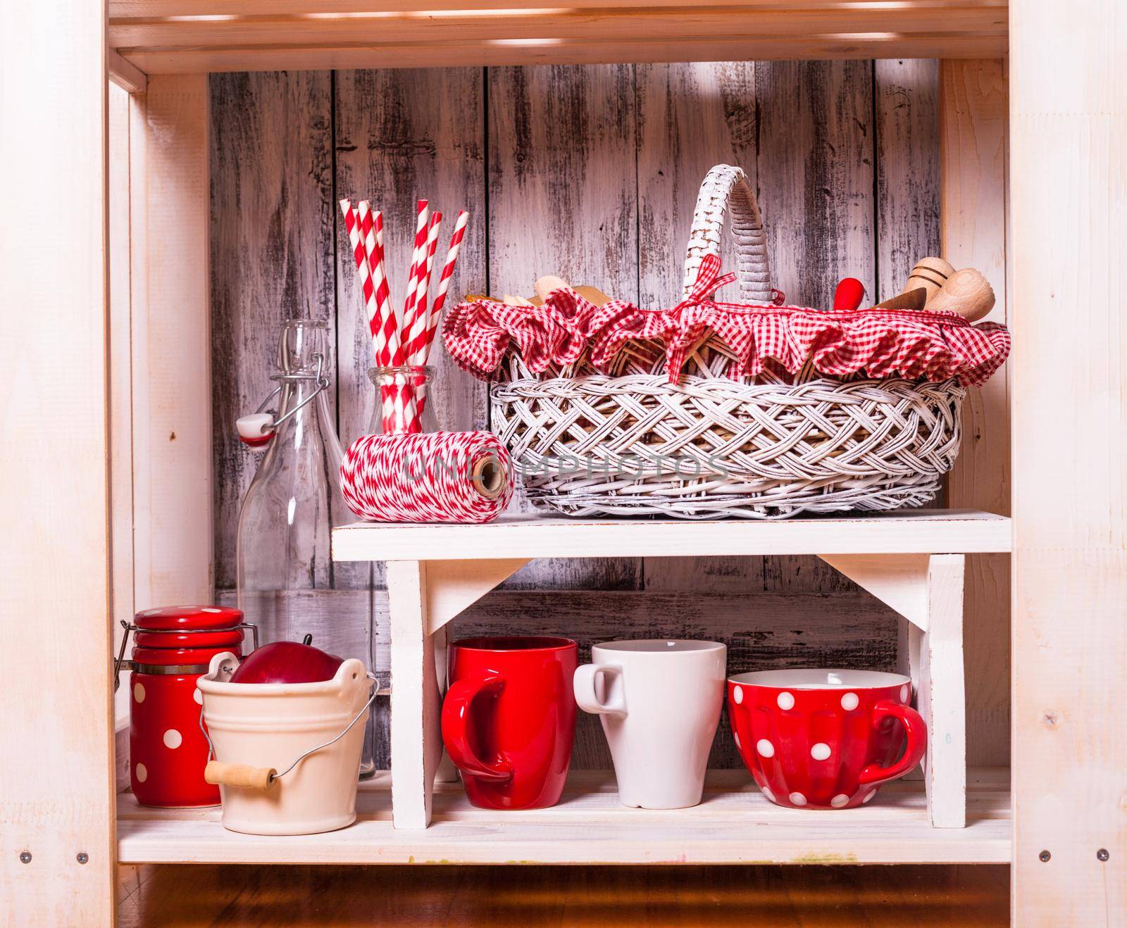 Shelves in the rack in the kitchen at shabby chic style