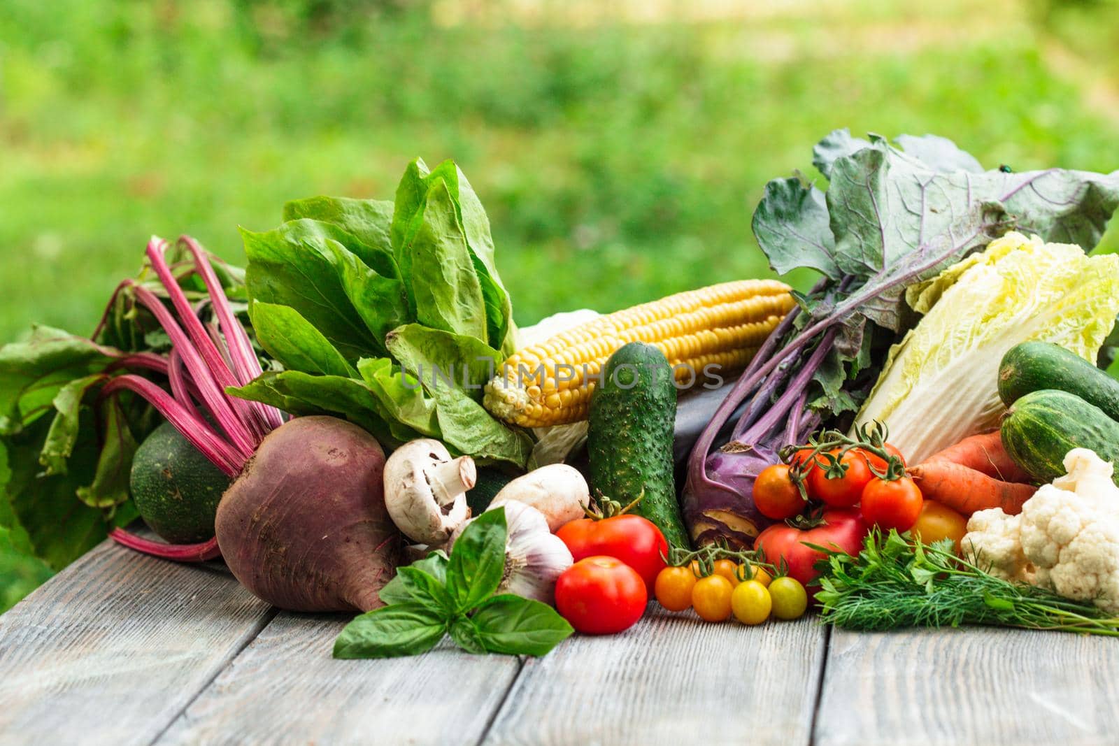 Various vegetables on a wooden table with copy space