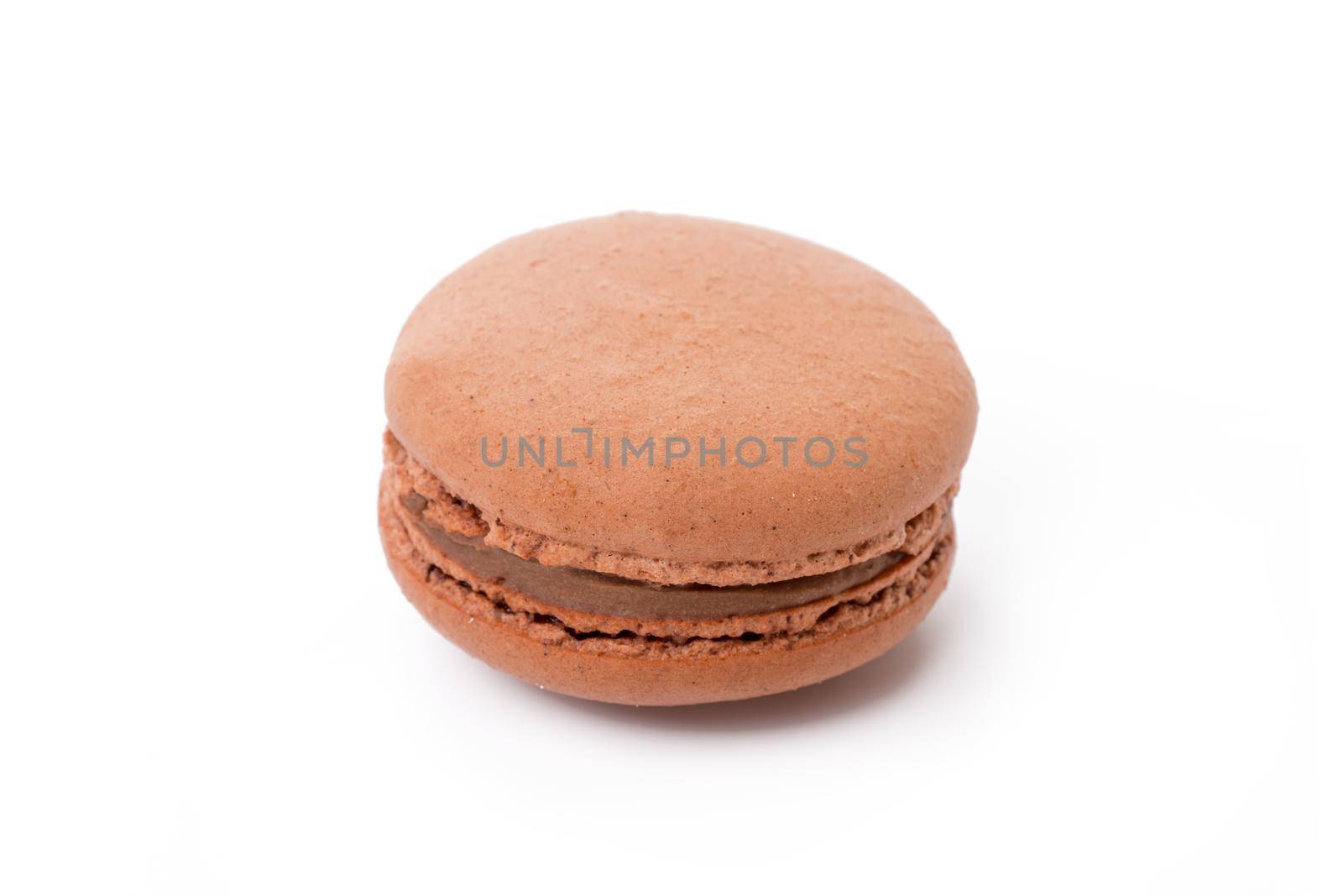 French colored macaroon cookie isolated on white by Fabrikasimf