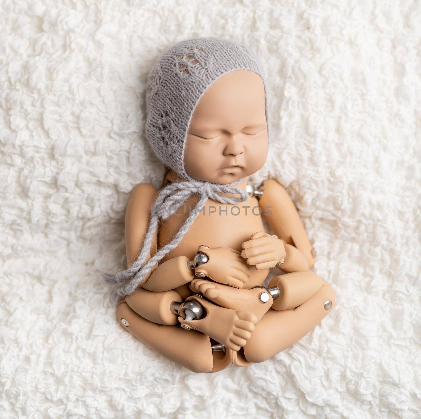 Toy of newborn baby for photo practice by tan4ikk1