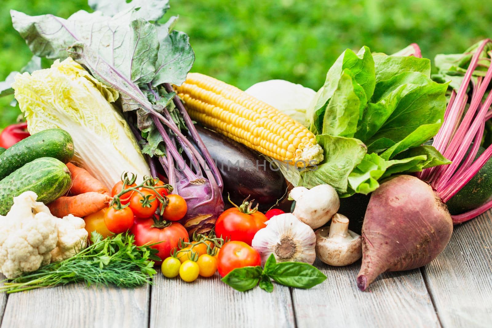 Various vegetables on a wooden table with copy space