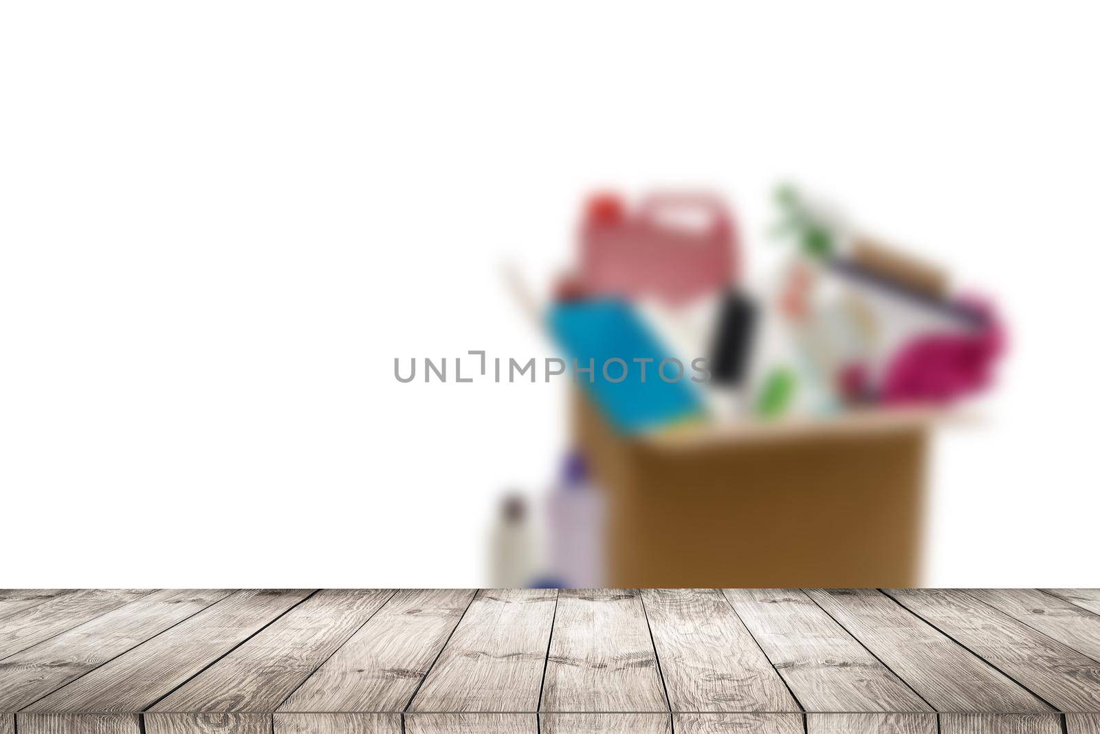 Chemical free home cleaner products concept. Using natural destilled white vinegar in spray bottle to remove stains. Tools on wooden table, bokeh background, copy space