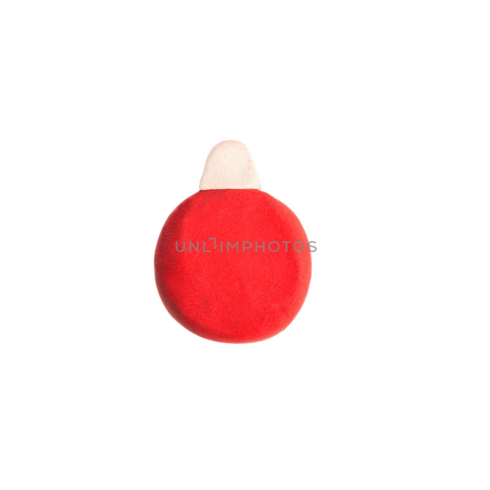 plasticine figure of red christmas tree toy isolated on white background