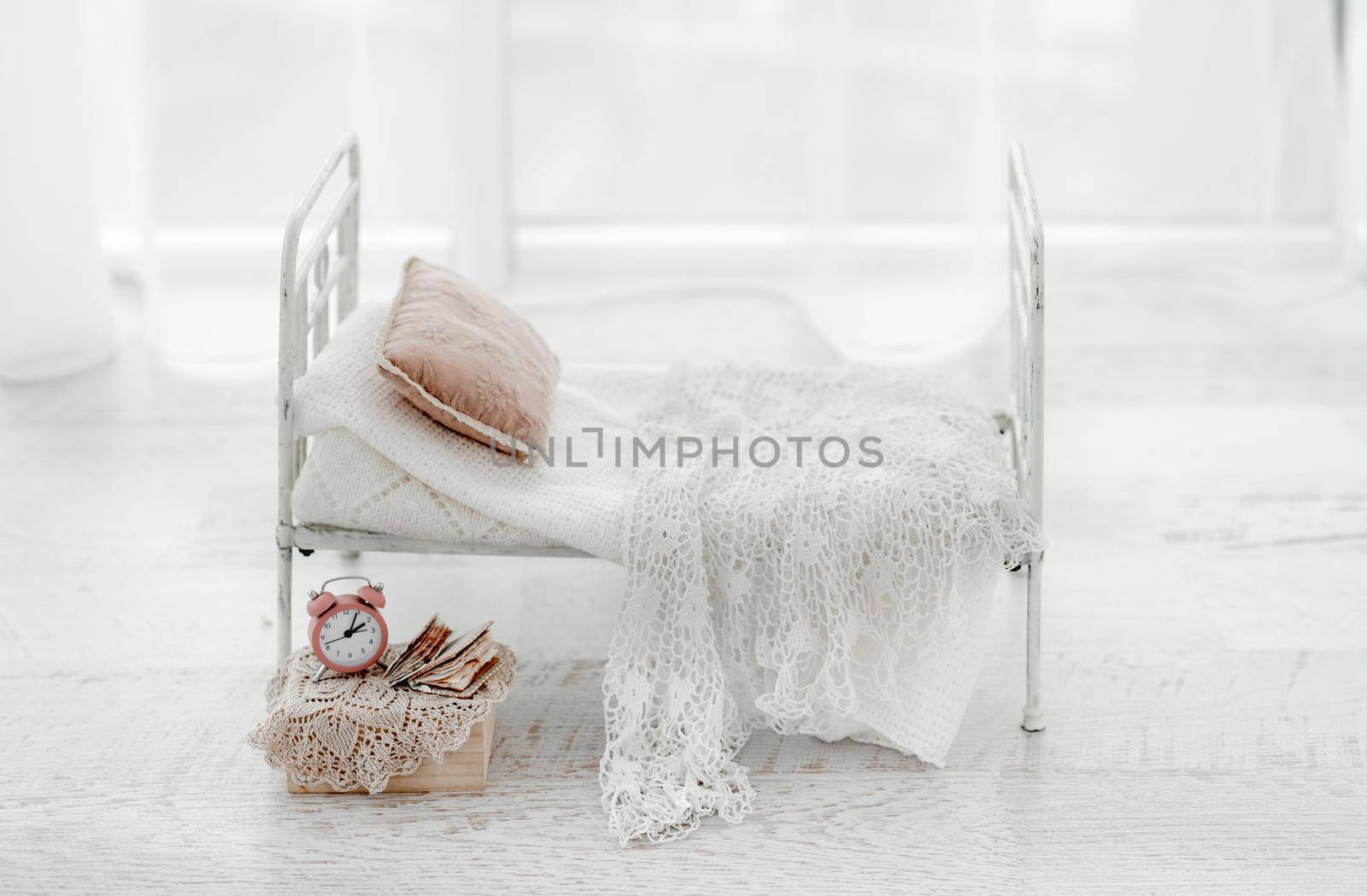Newborn digital background for baby photosession. White composite with bed, knitted blanket and clock.