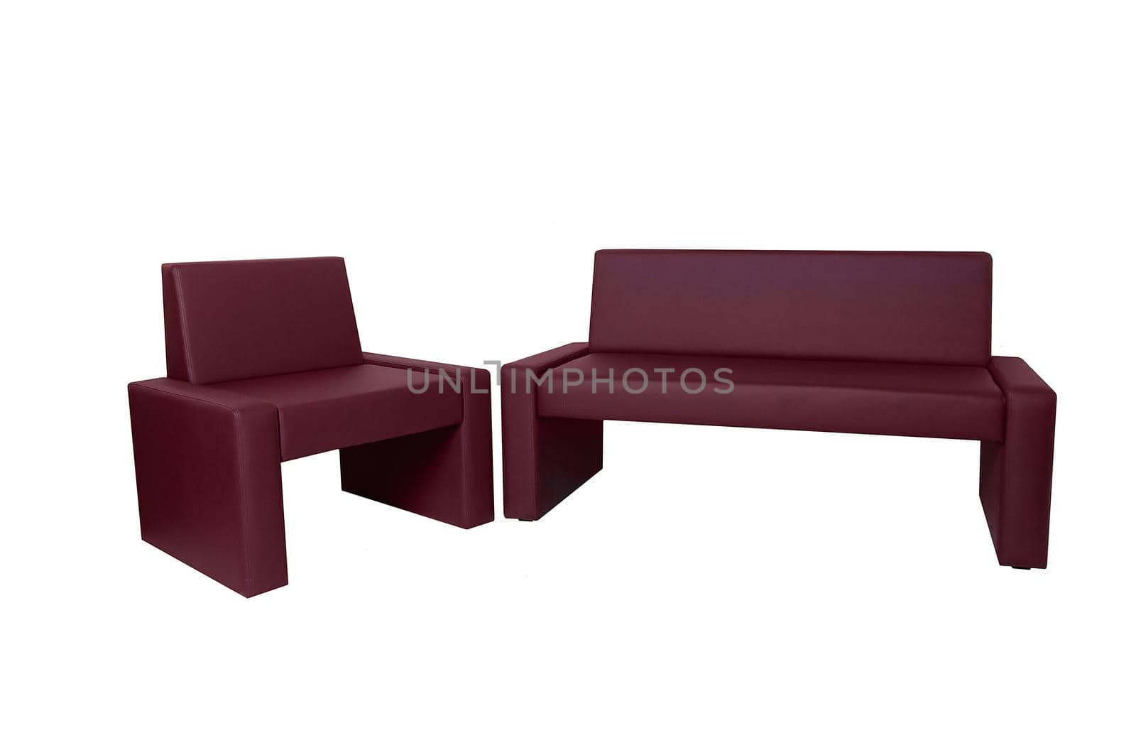 Unusual modern red leather bench and chair isolated on white background. Strict style furniture. Creative approach to making furniture