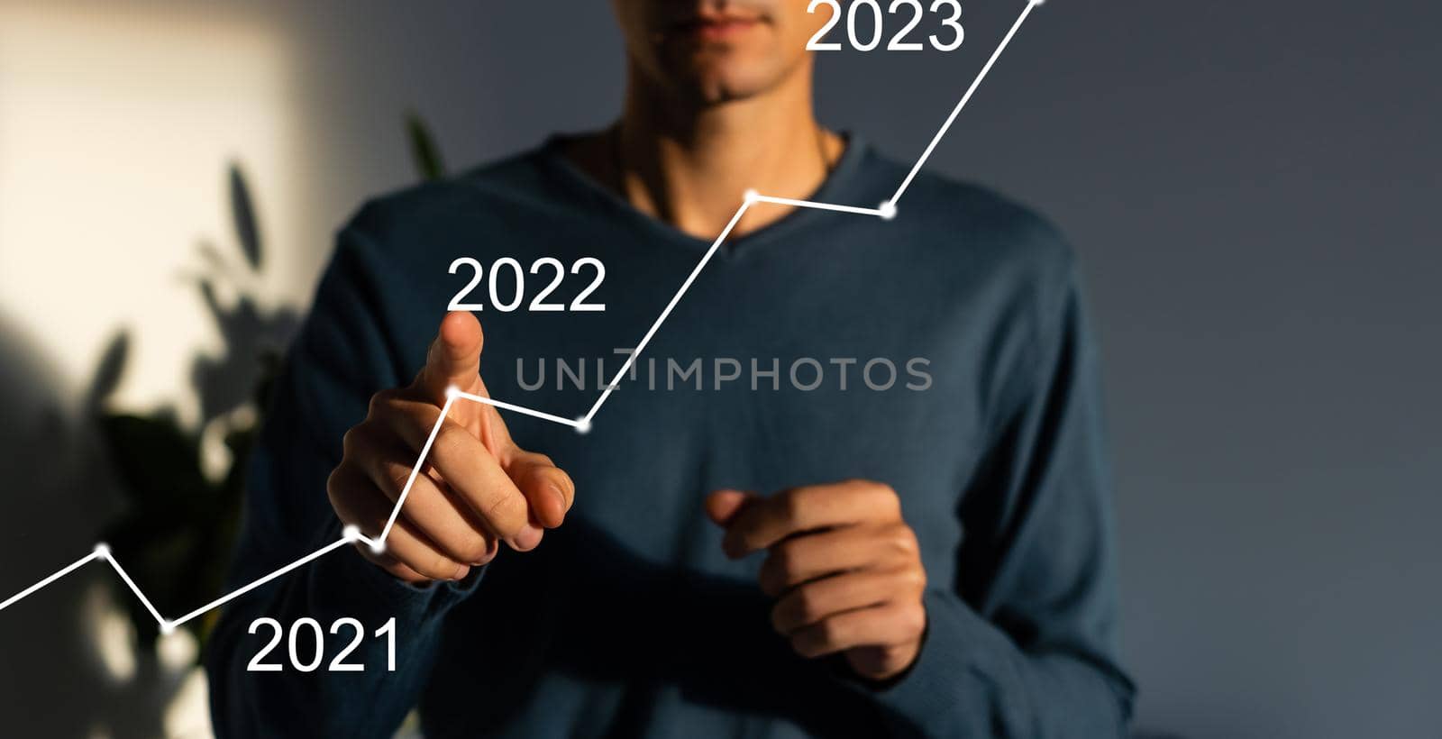 businessman hand working with virtual chart business on touch screen computer as concept.