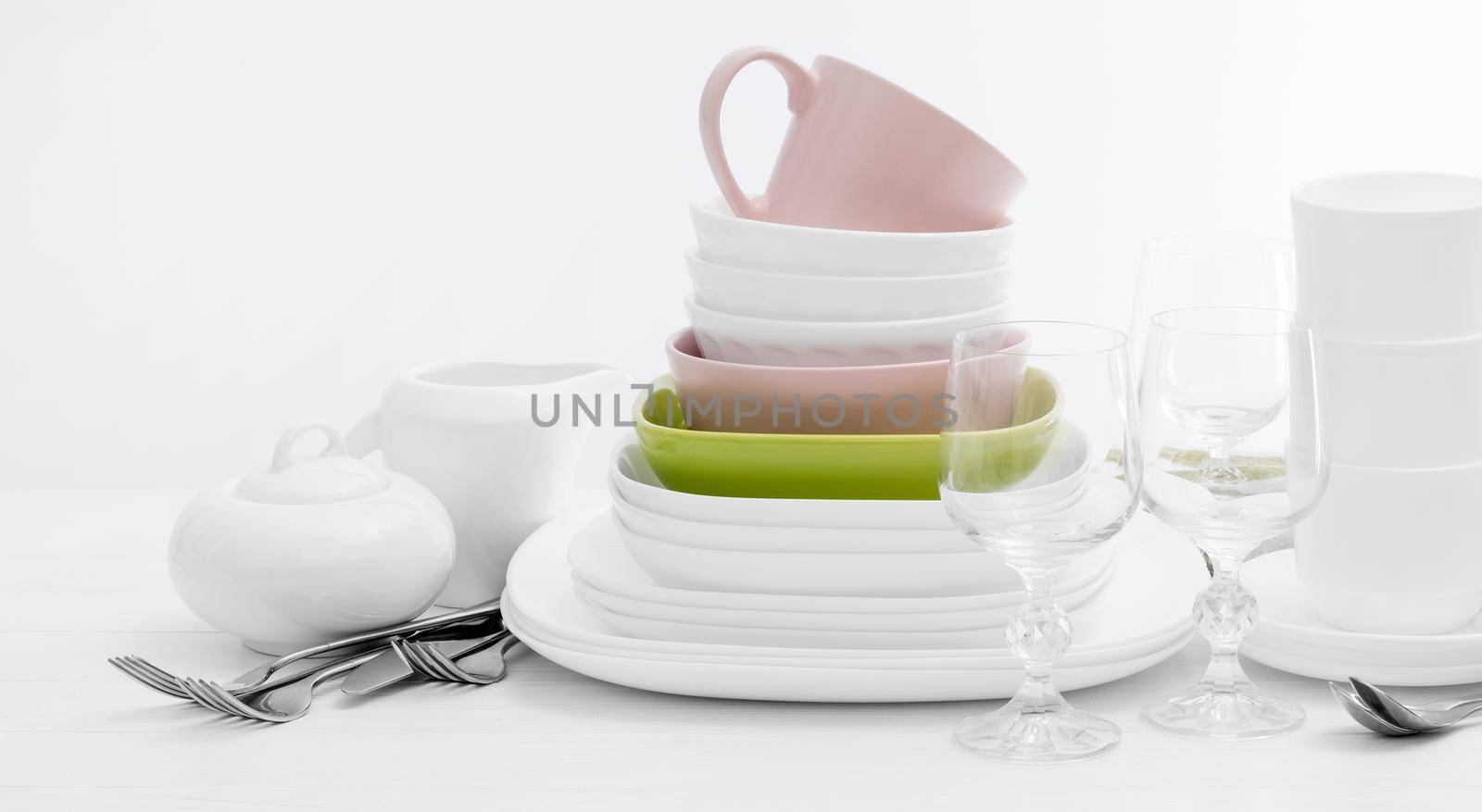 Pile of colourful square dishes and cups by tan4ikk1