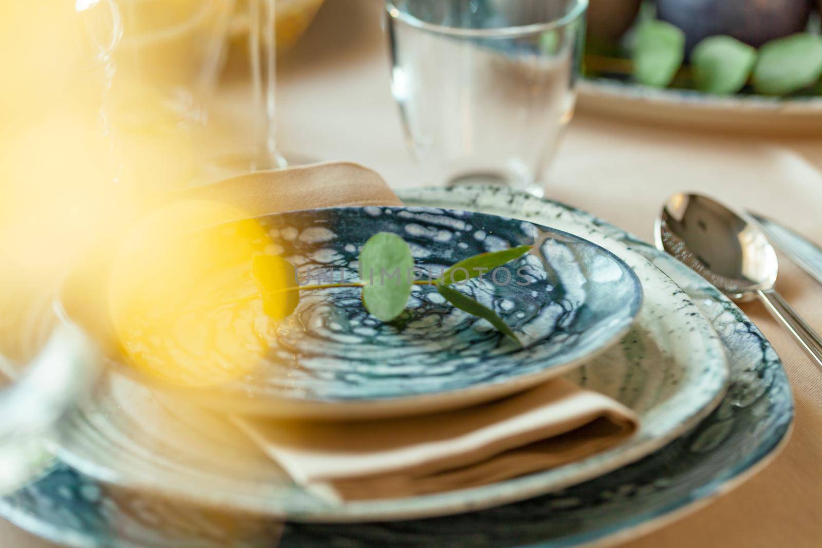 Blurred picture of an elegant table setting. High quality photo